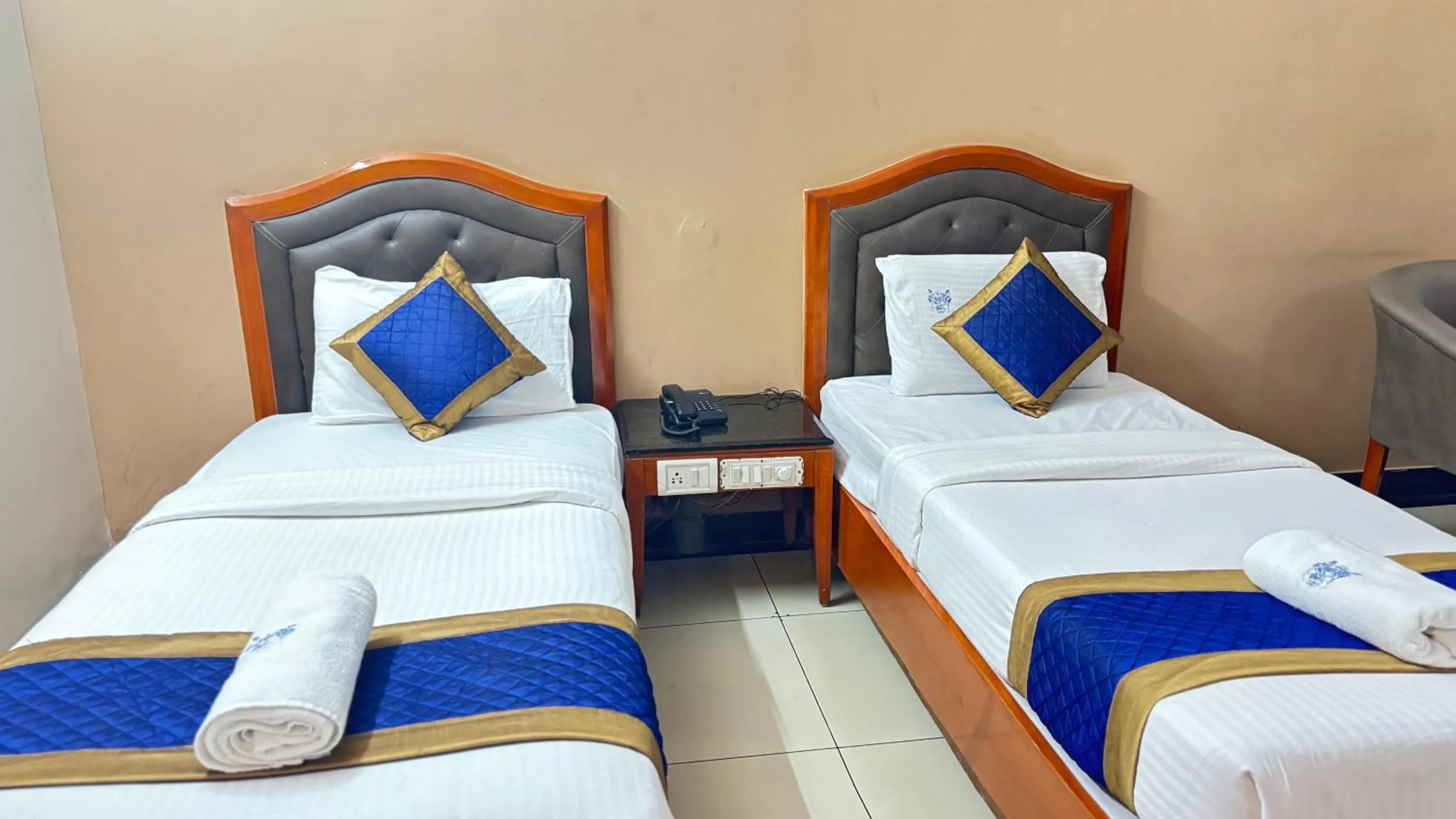 Bed in Hotel Chetan International
