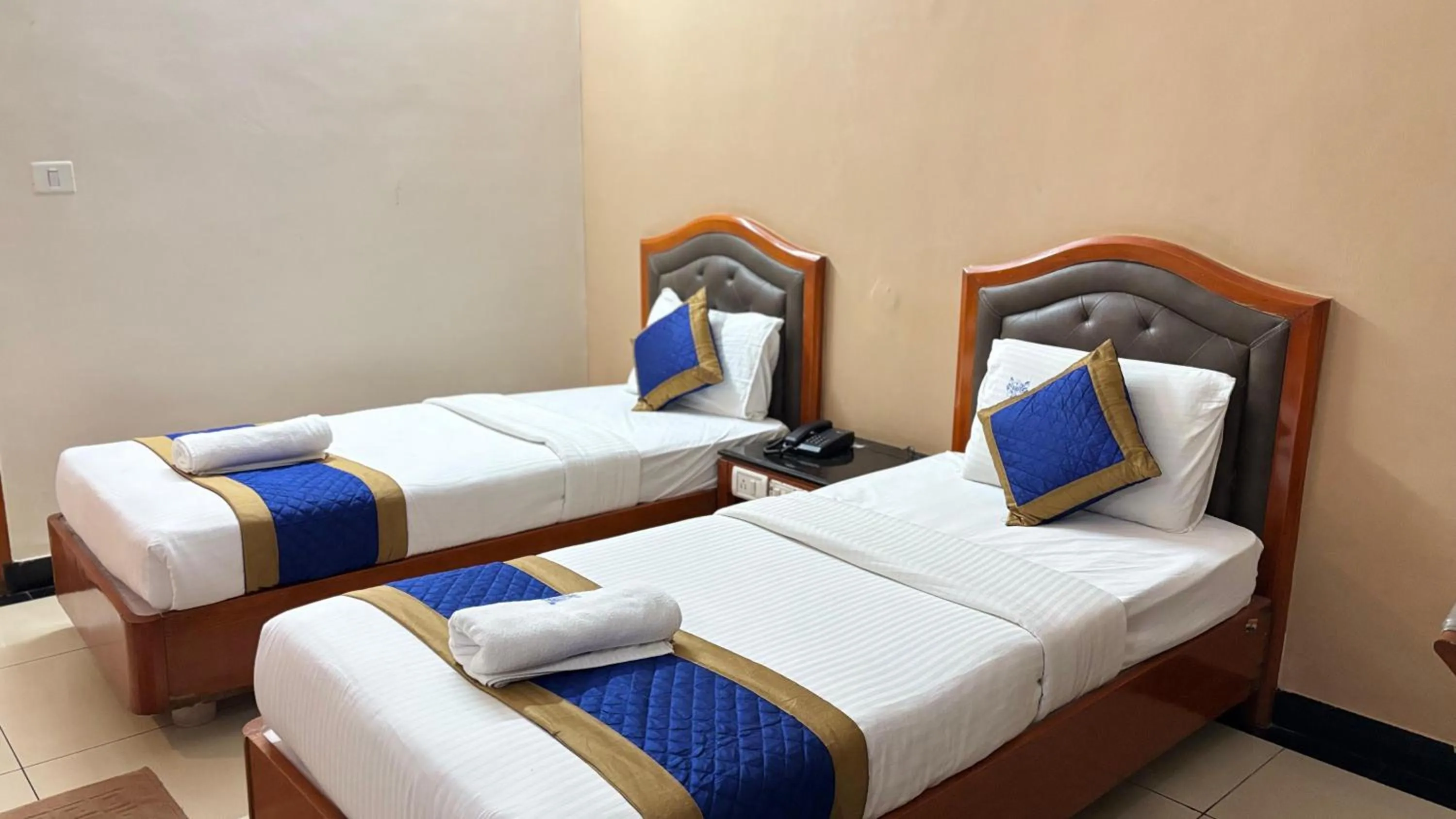 Bed in Hotel Chetan International
