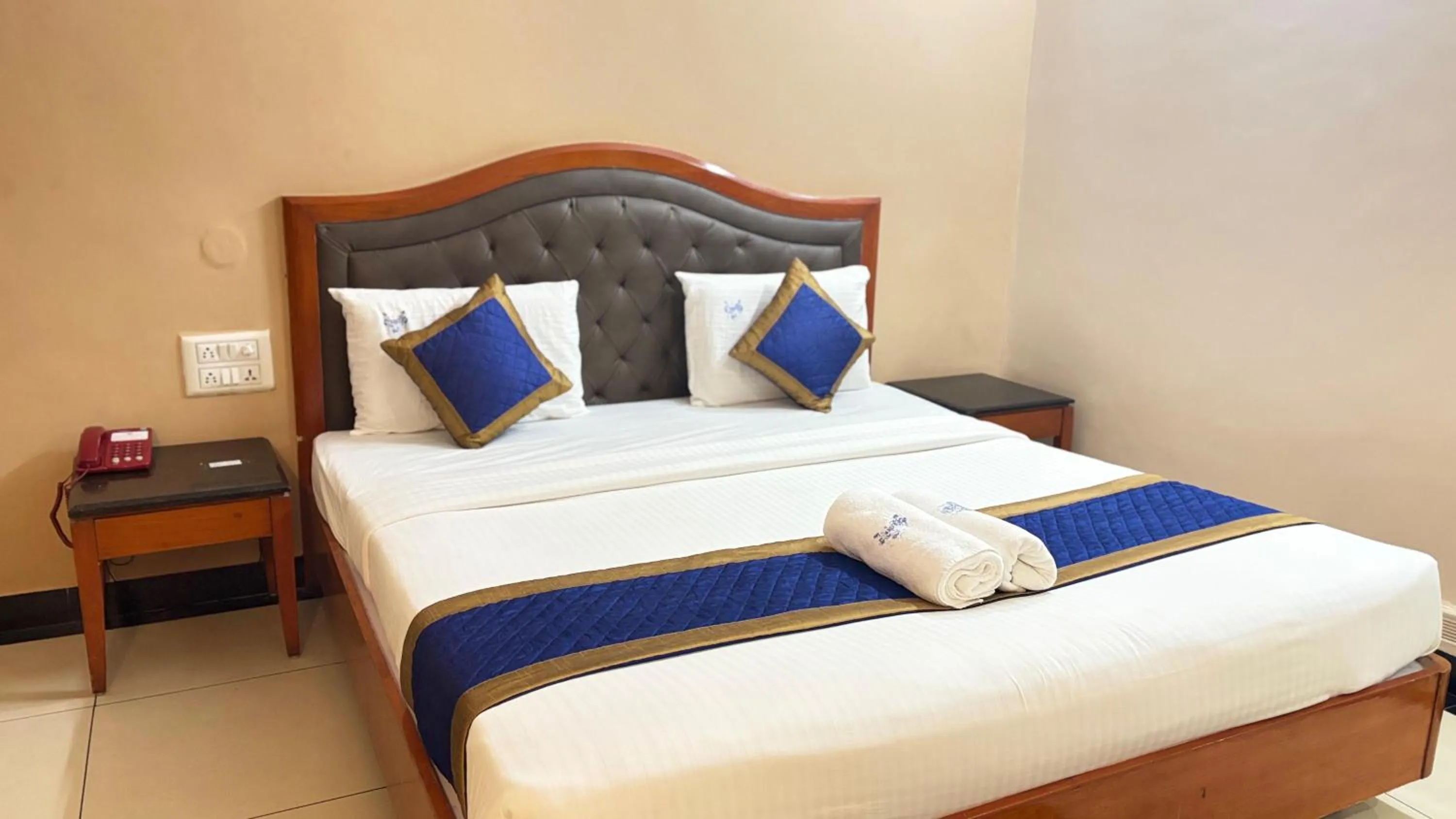Bed in Hotel Chetan International