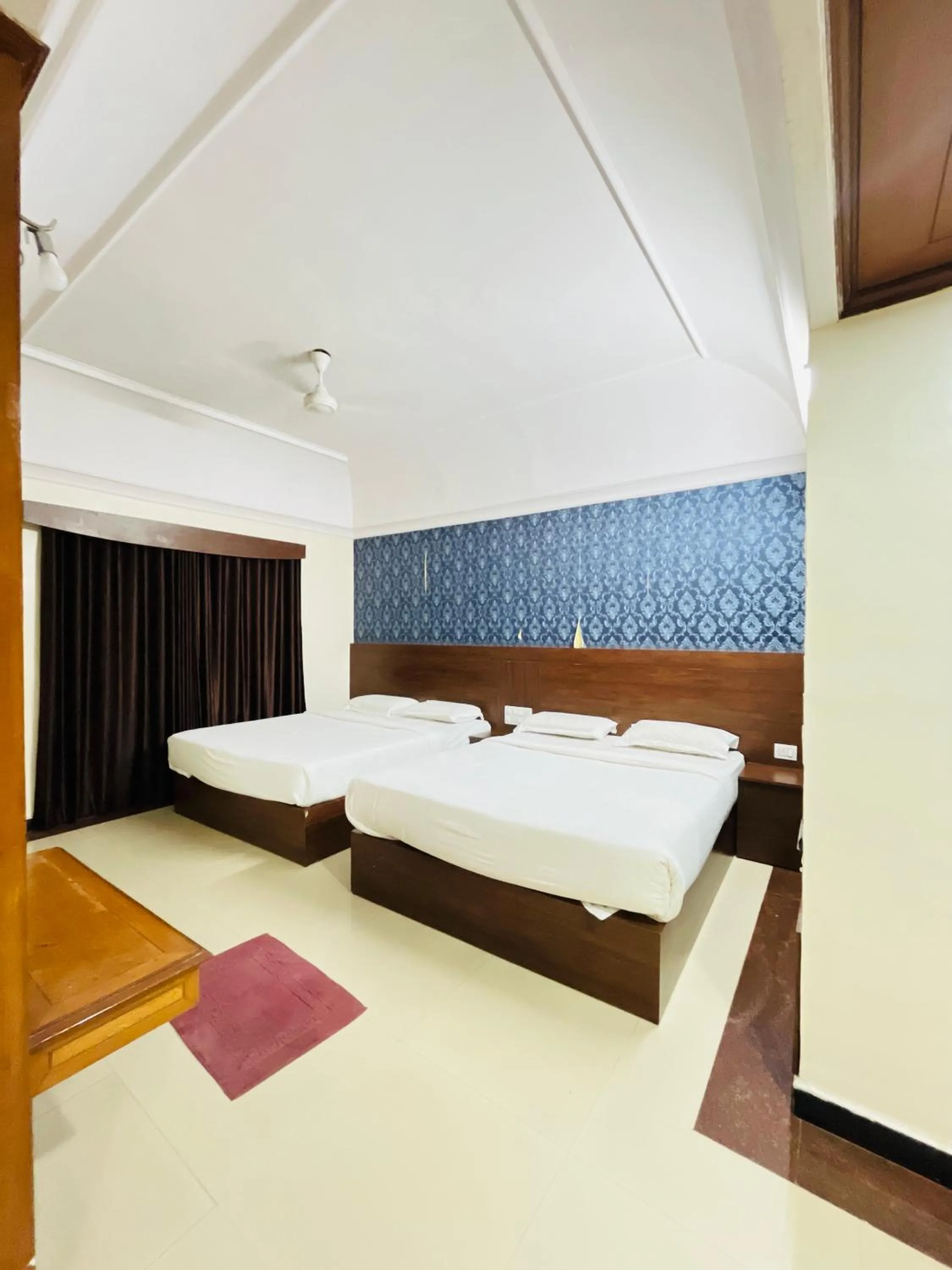 Bed in Hotel Chetan International