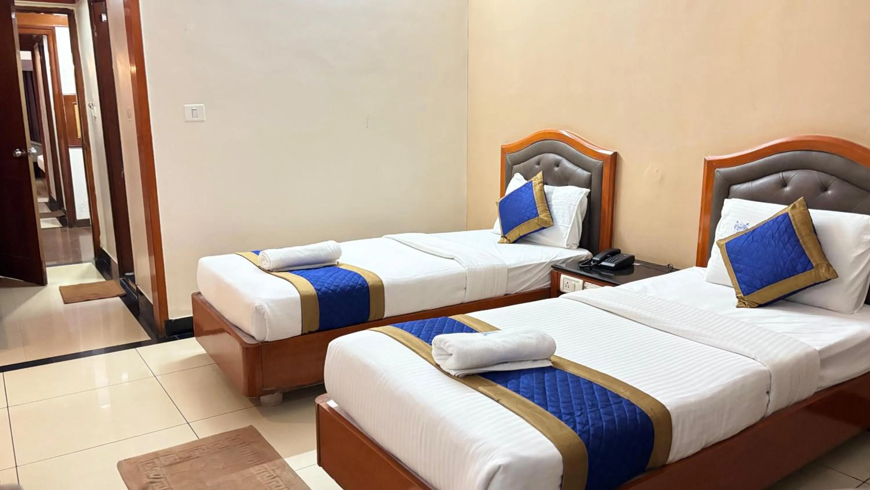 Bed in Hotel Chetan International