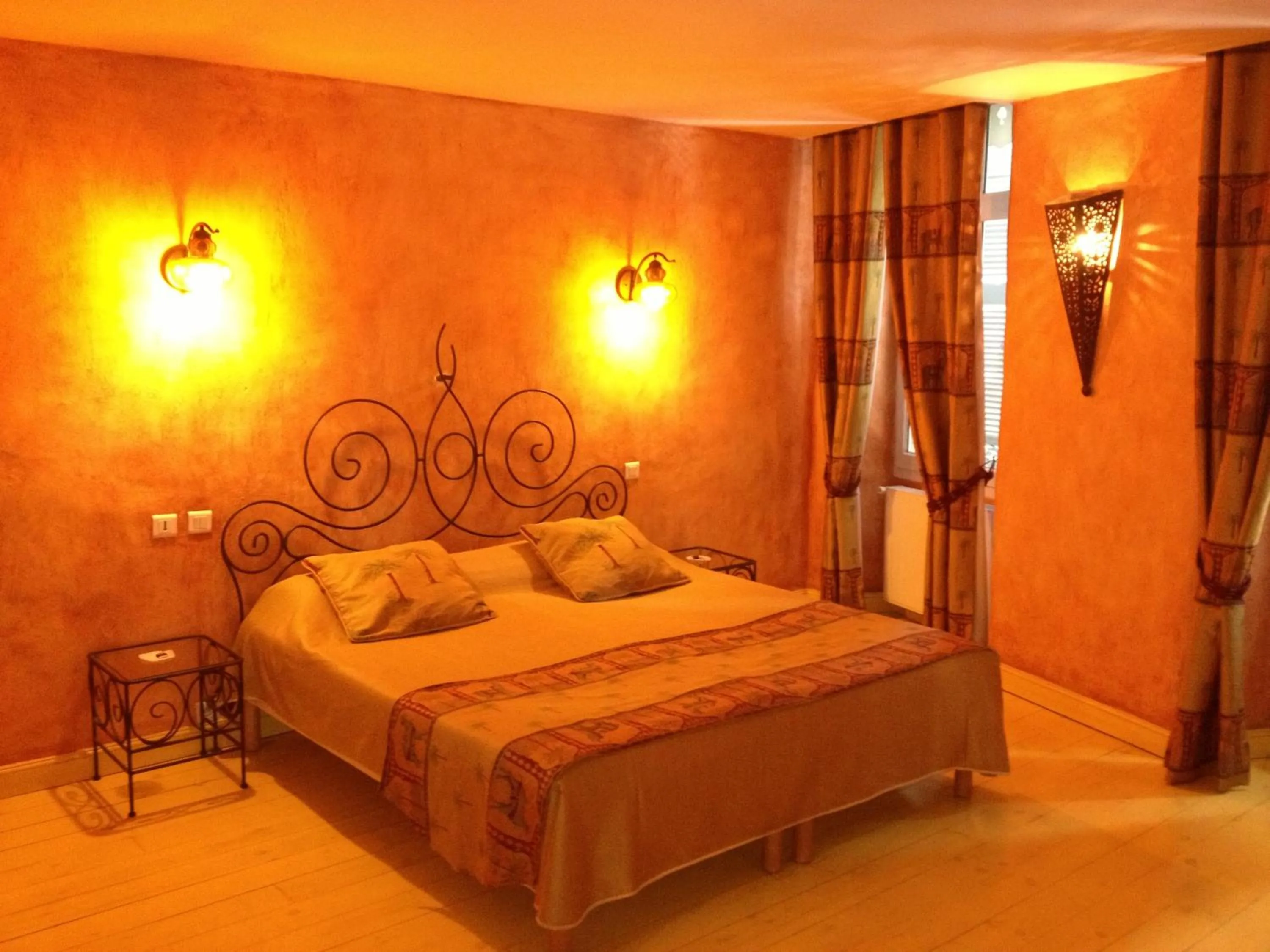 Bed in Hotel L'Astrolabe