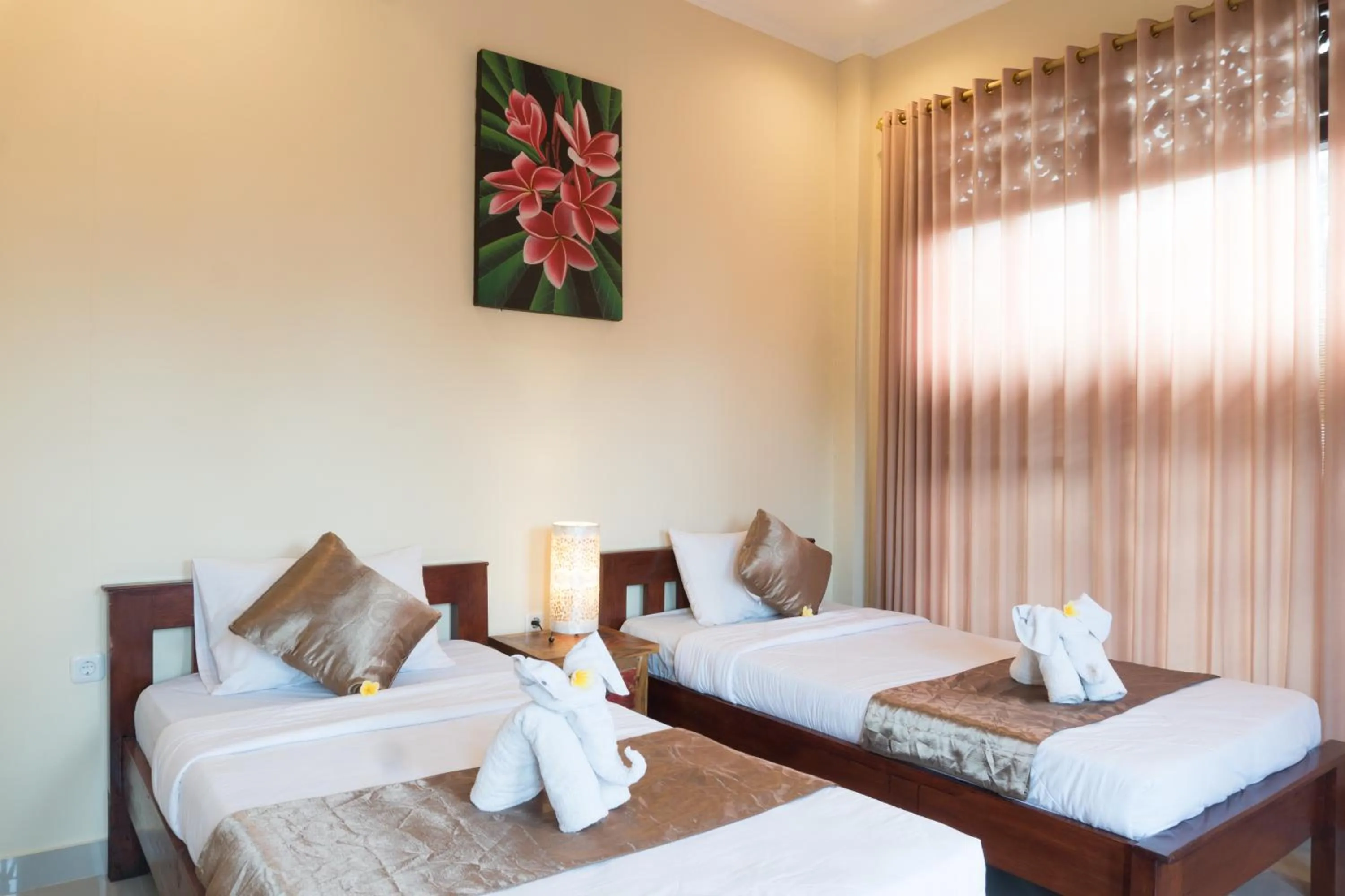 Photo of the whole room, Bed in The Lumbung Jaya by Uniquecations