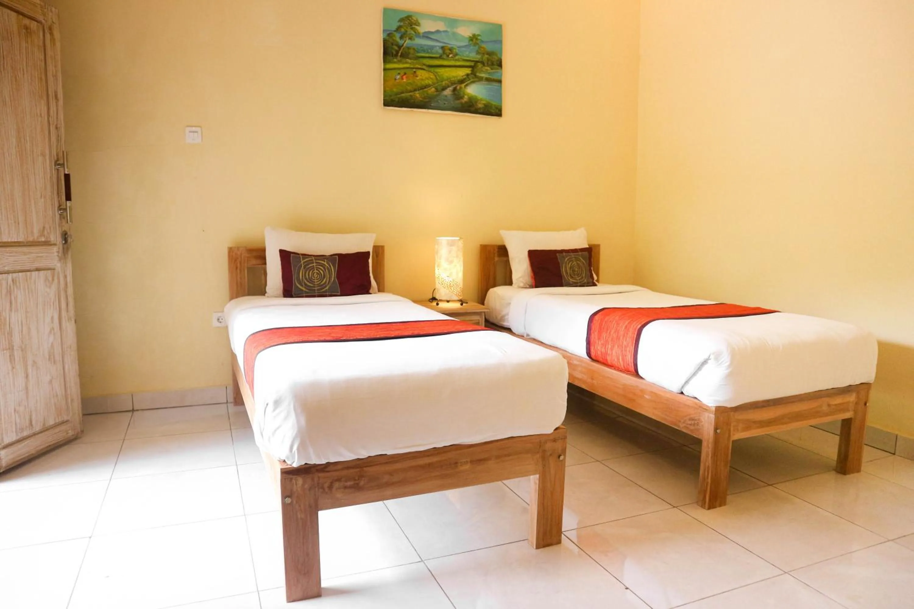 Bed in The Lumbung Jaya by Uniquecations