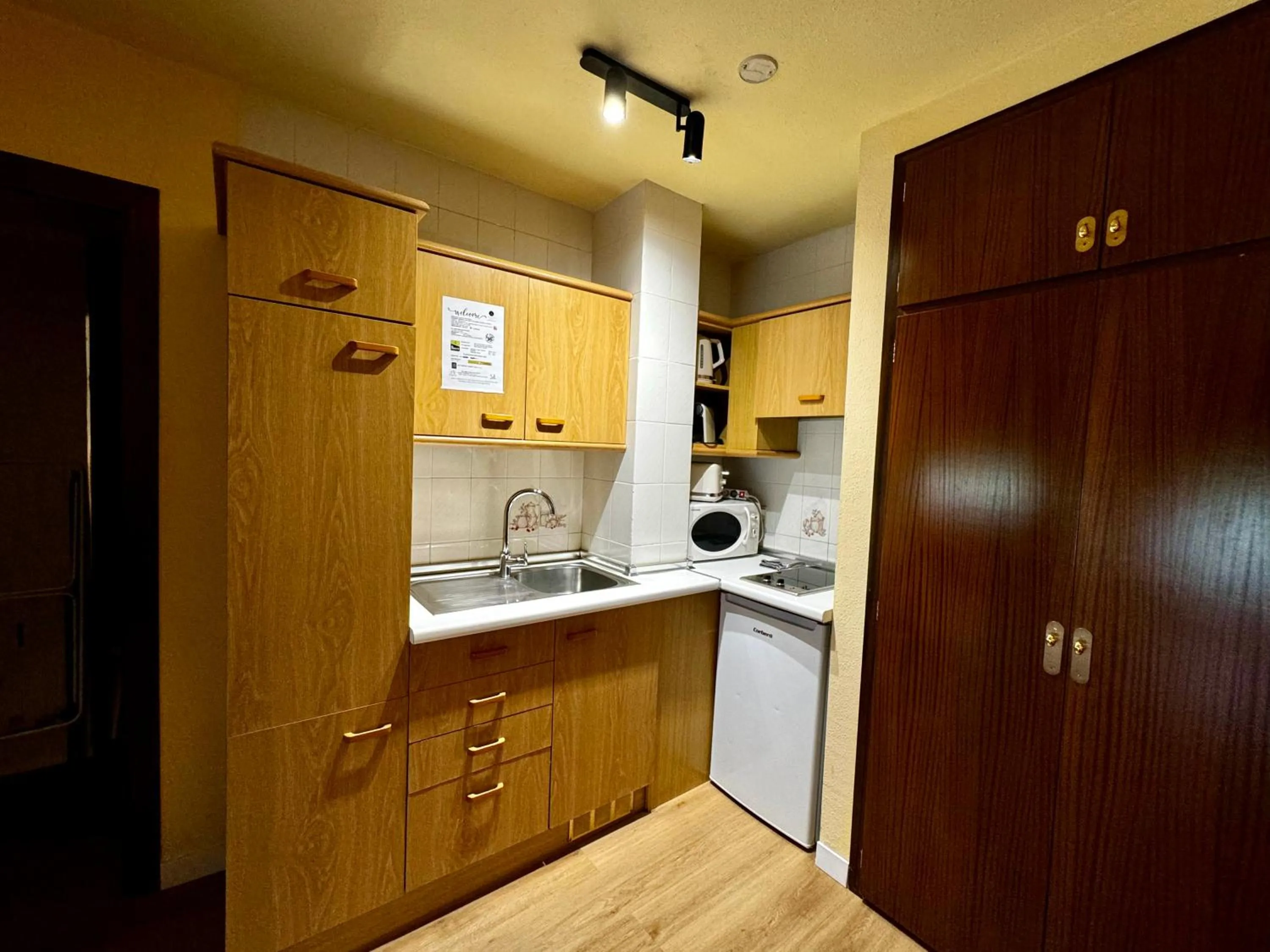 Kitchen or kitchenette in Apartamentos Turisticos Poblado