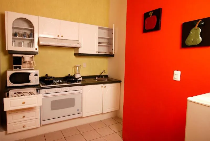 Kitchen or kitchenette in Hotel & Suites Galeria