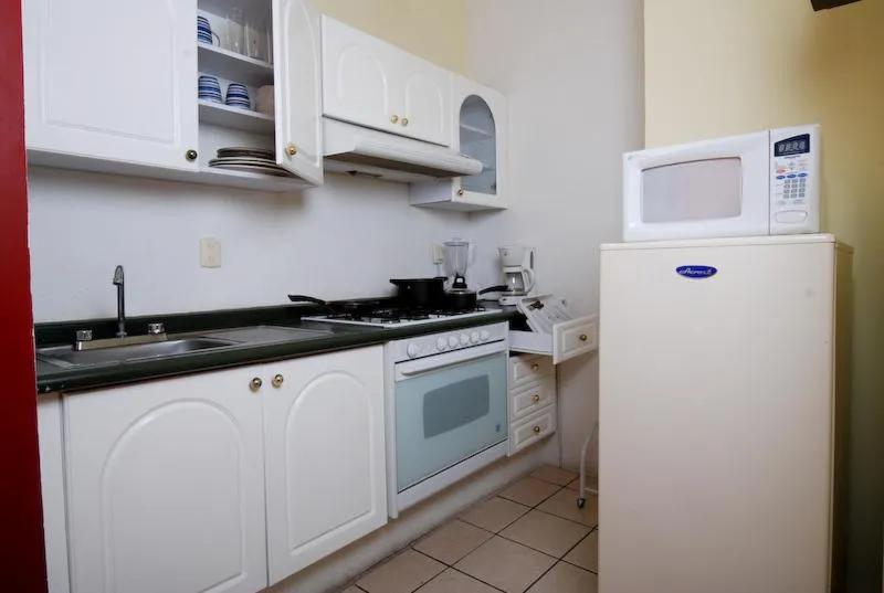 Kitchen or kitchenette in Hotel & Suites Galeria