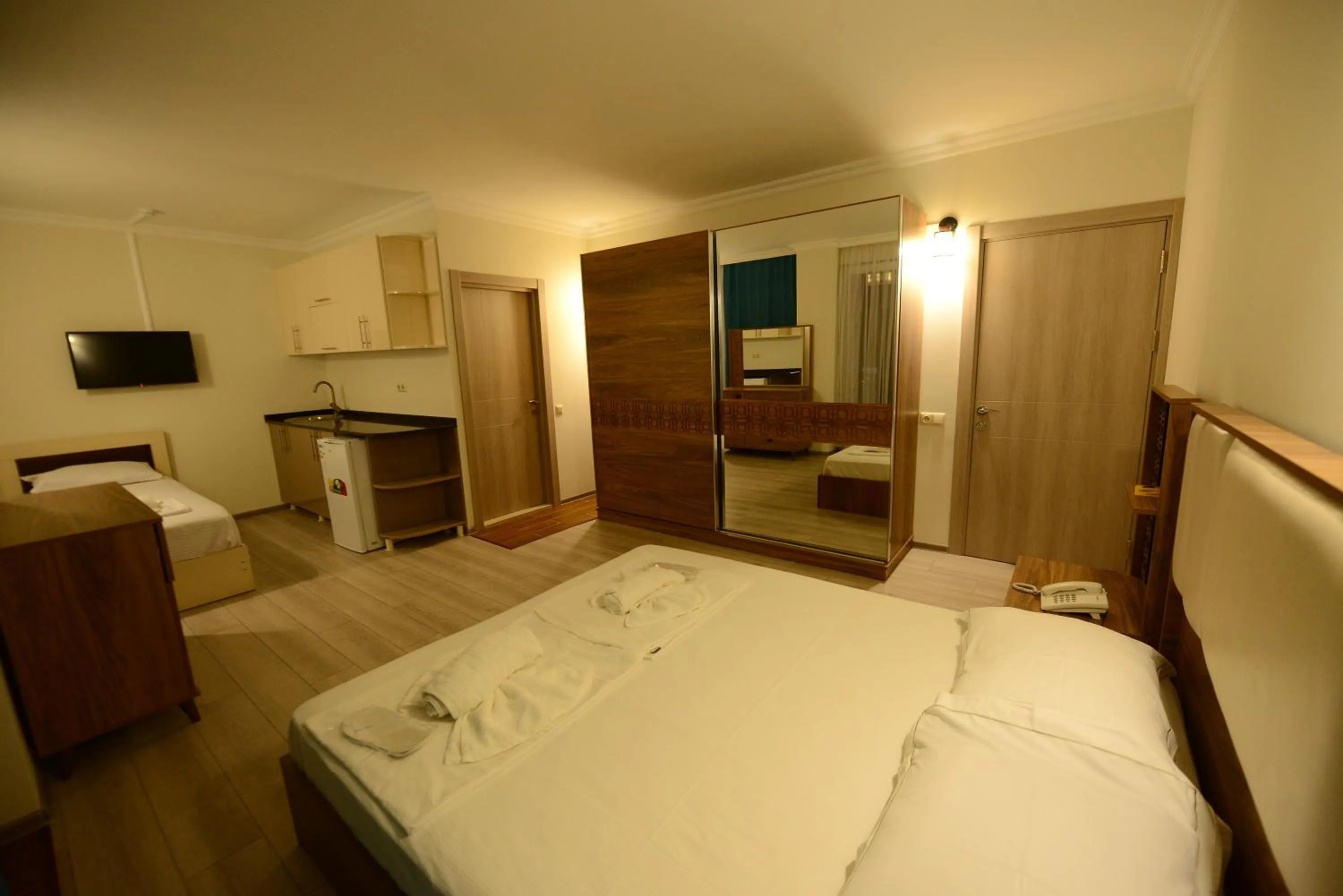 Kitchen or kitchenette, Bed in Hotel Aristocrat Batumi