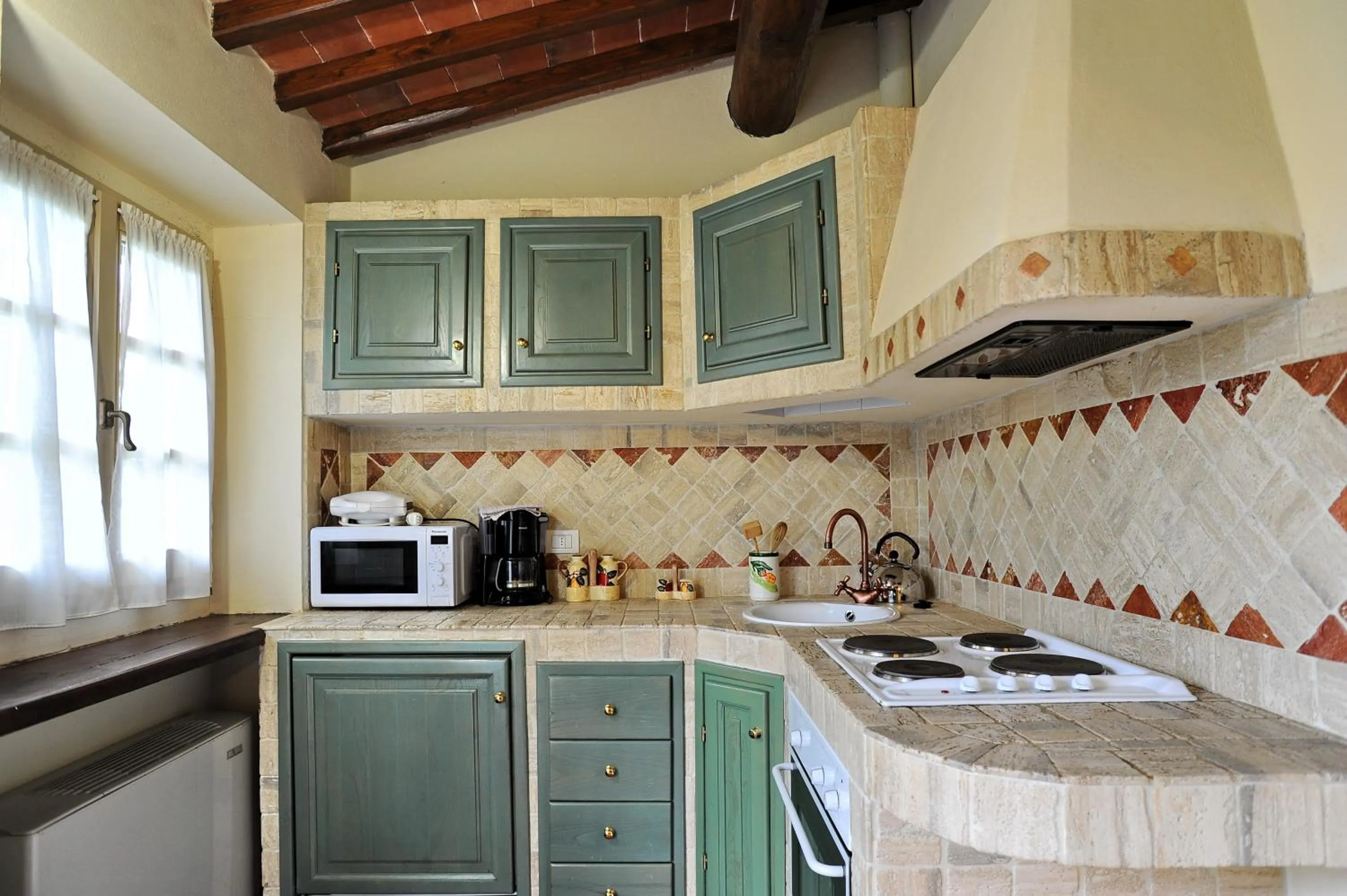 Kitchen or kitchenette in Erboli Residence