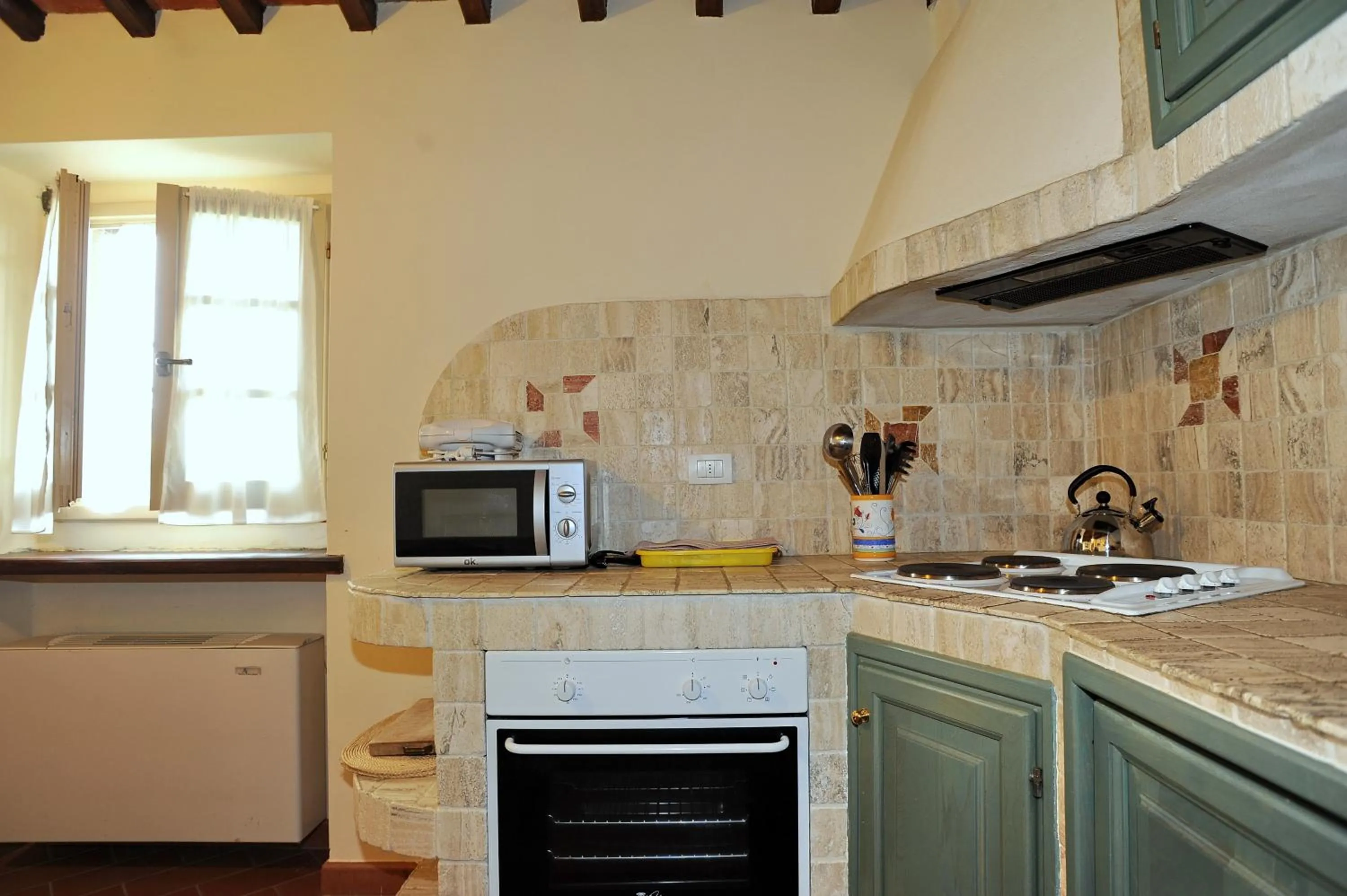 Kitchen or kitchenette in Erboli Residence