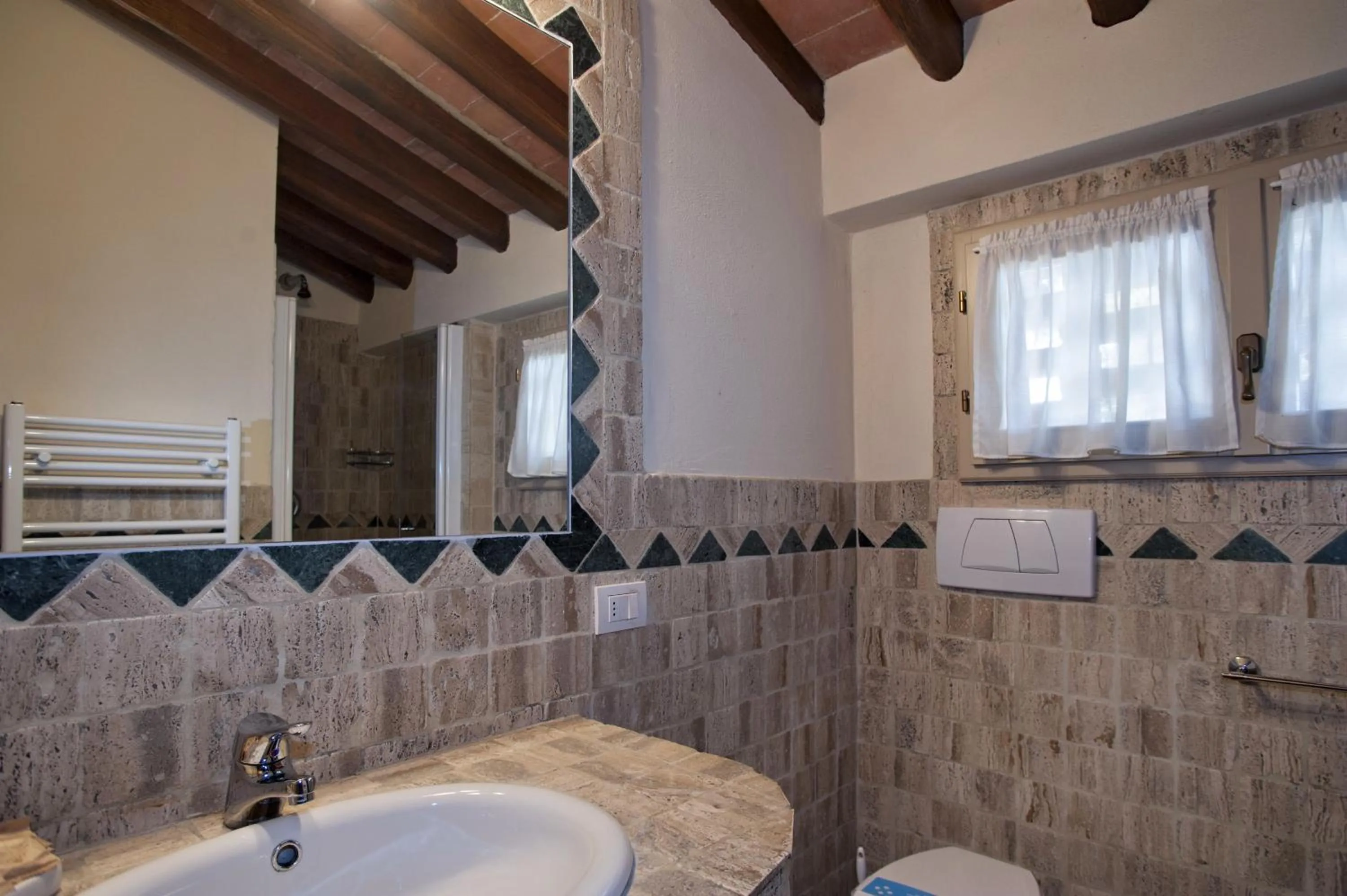 Shower in Erboli Residence