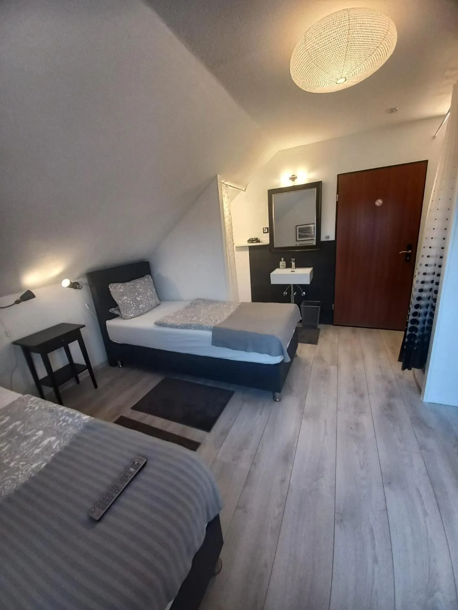 Communal lounge/ TV room, Bed in Best Pension