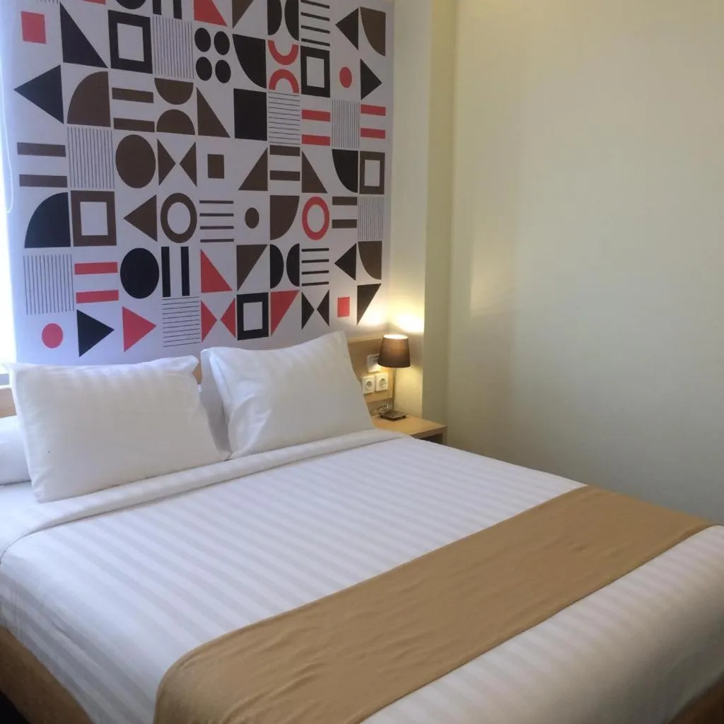 Bed in Front One Inn Kediri