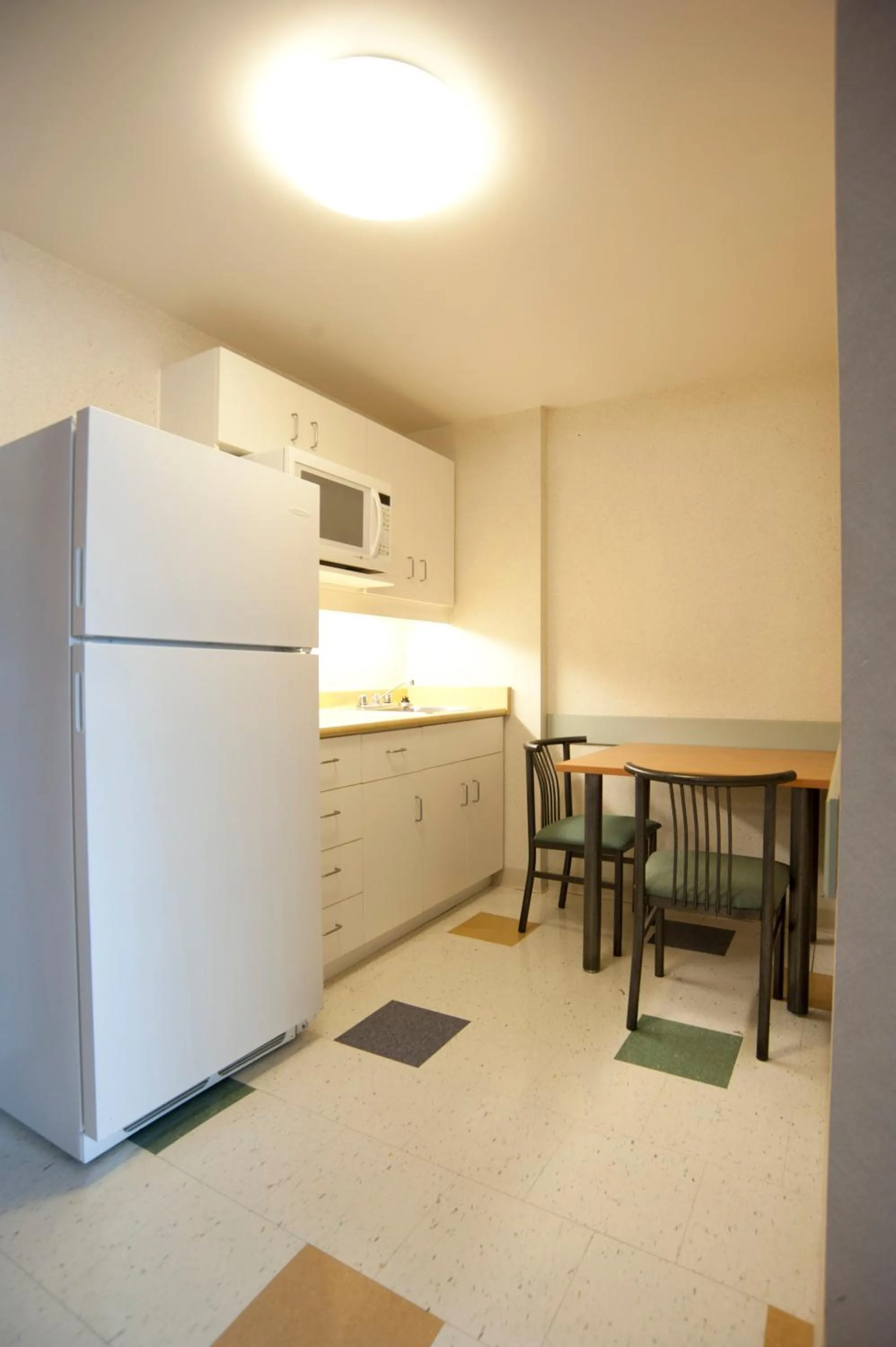 Kitchen or kitchenette in Residence & Conference Centre- Barrie
