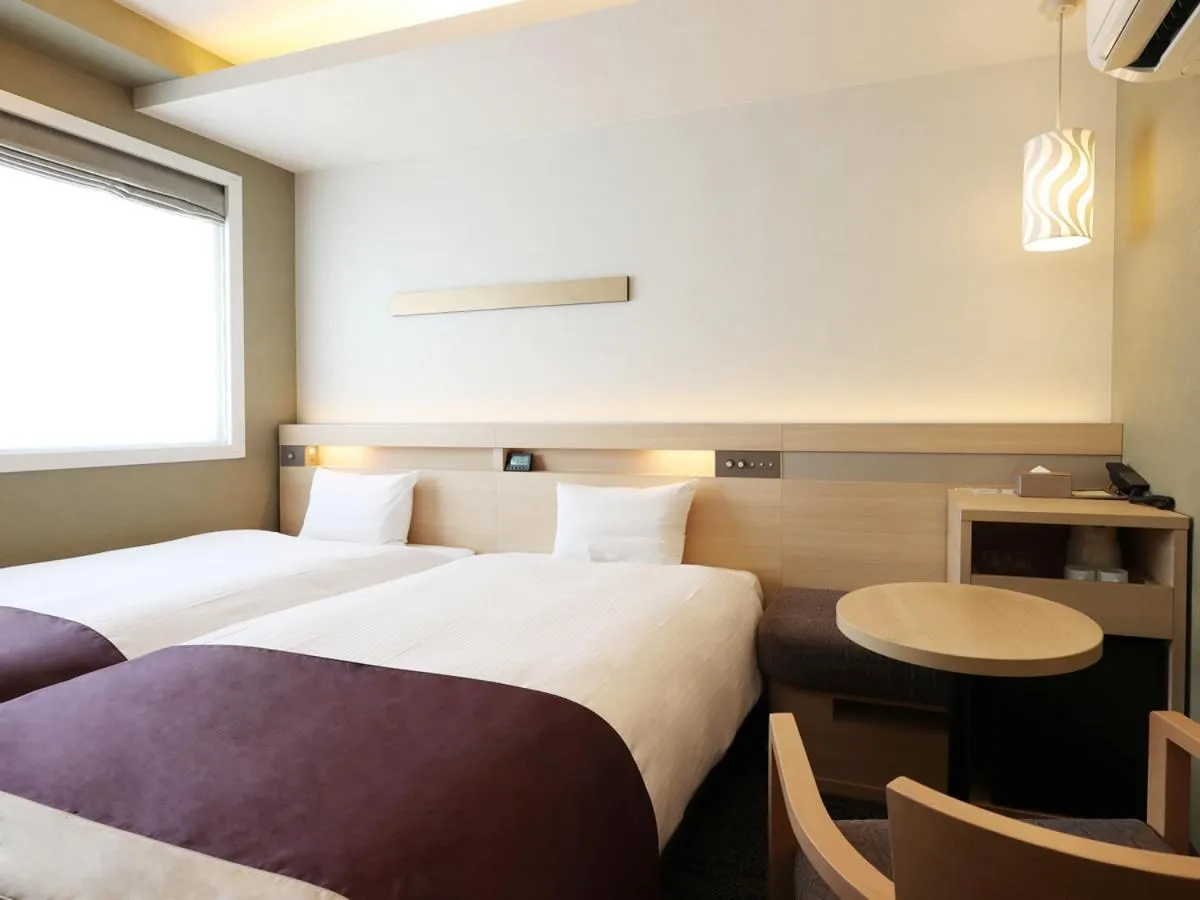 Bed in Urban Hotel Kyoto Shijo Premium