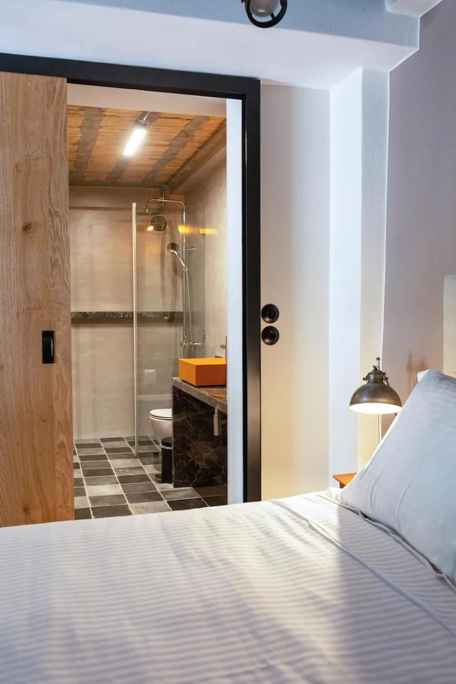 Bathroom, Bed in The Foundry Suites