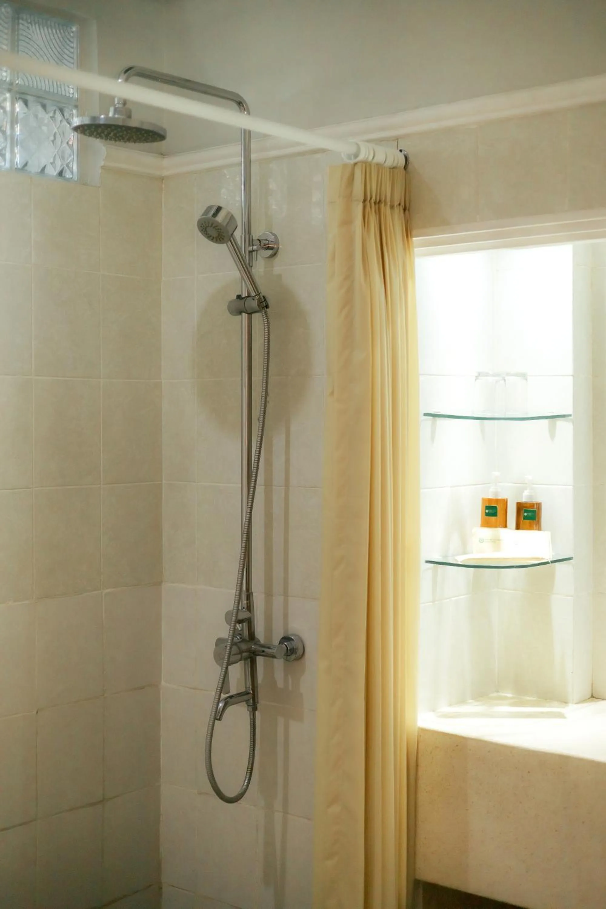 Bathroom in Fourteen Roses Beach Hotel