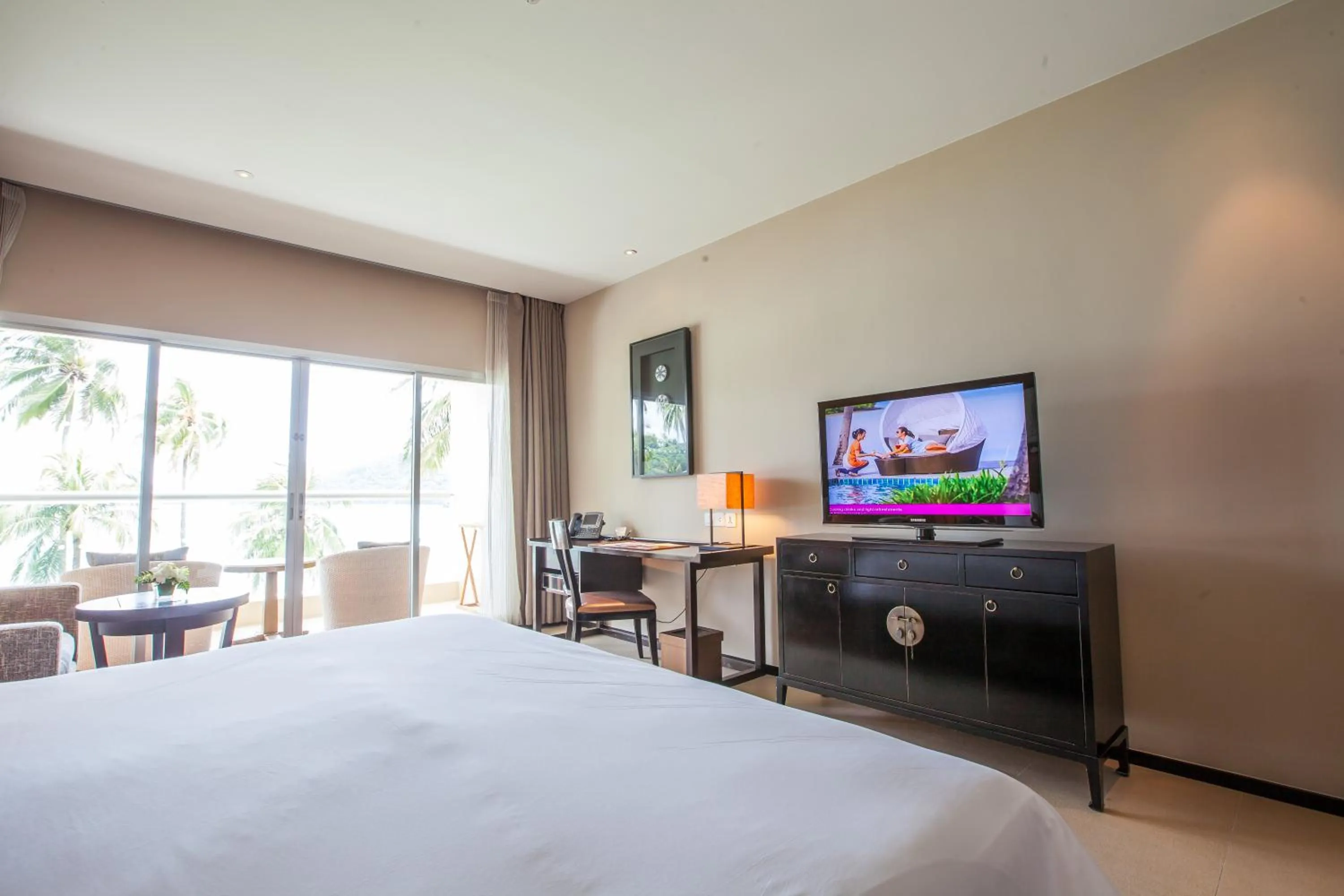 Bedroom, TV/Entertainment Center in Phuket Panwa Beachfront Resort