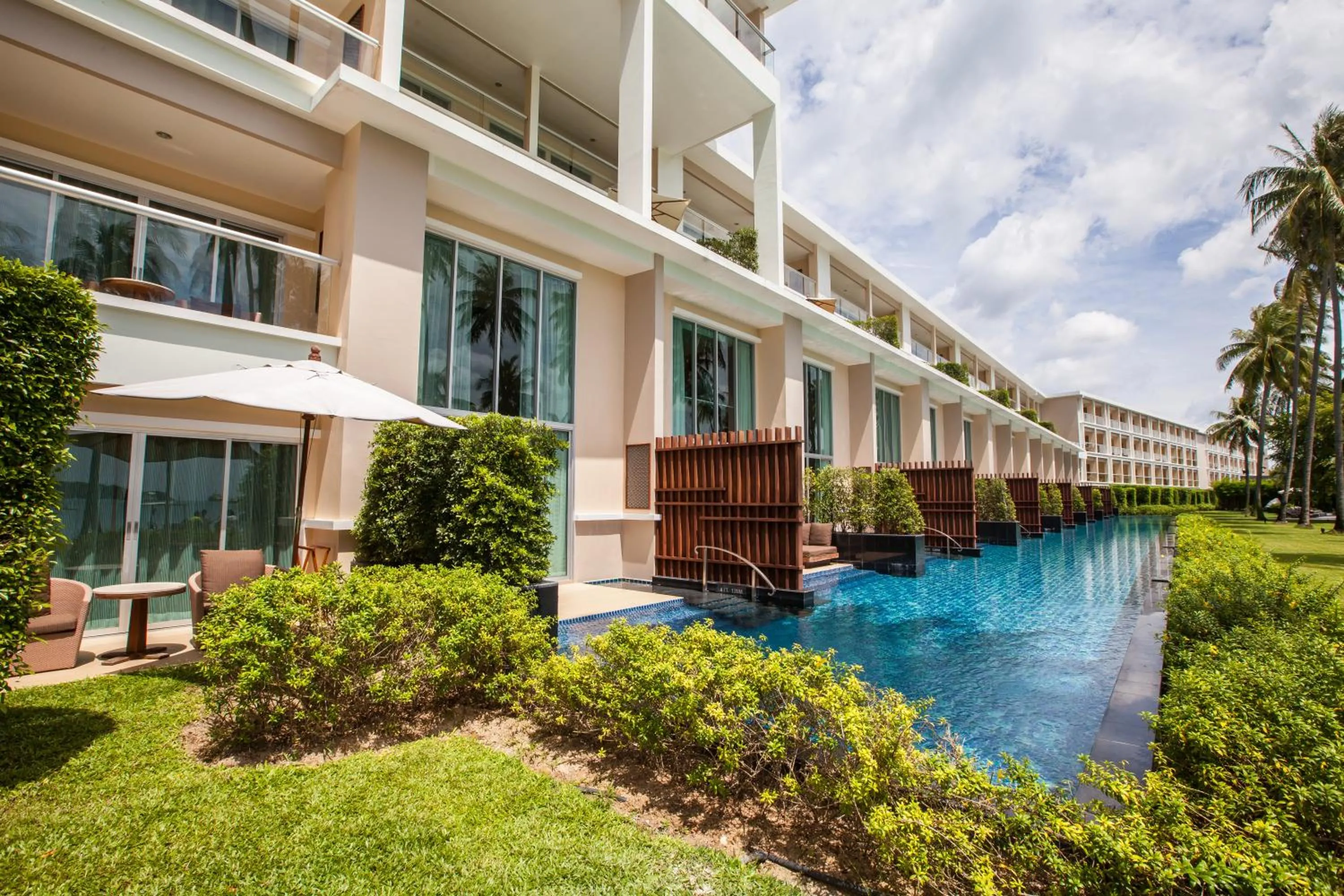 Swimming pool, Property Building in Phuket Panwa Beachfront Resort