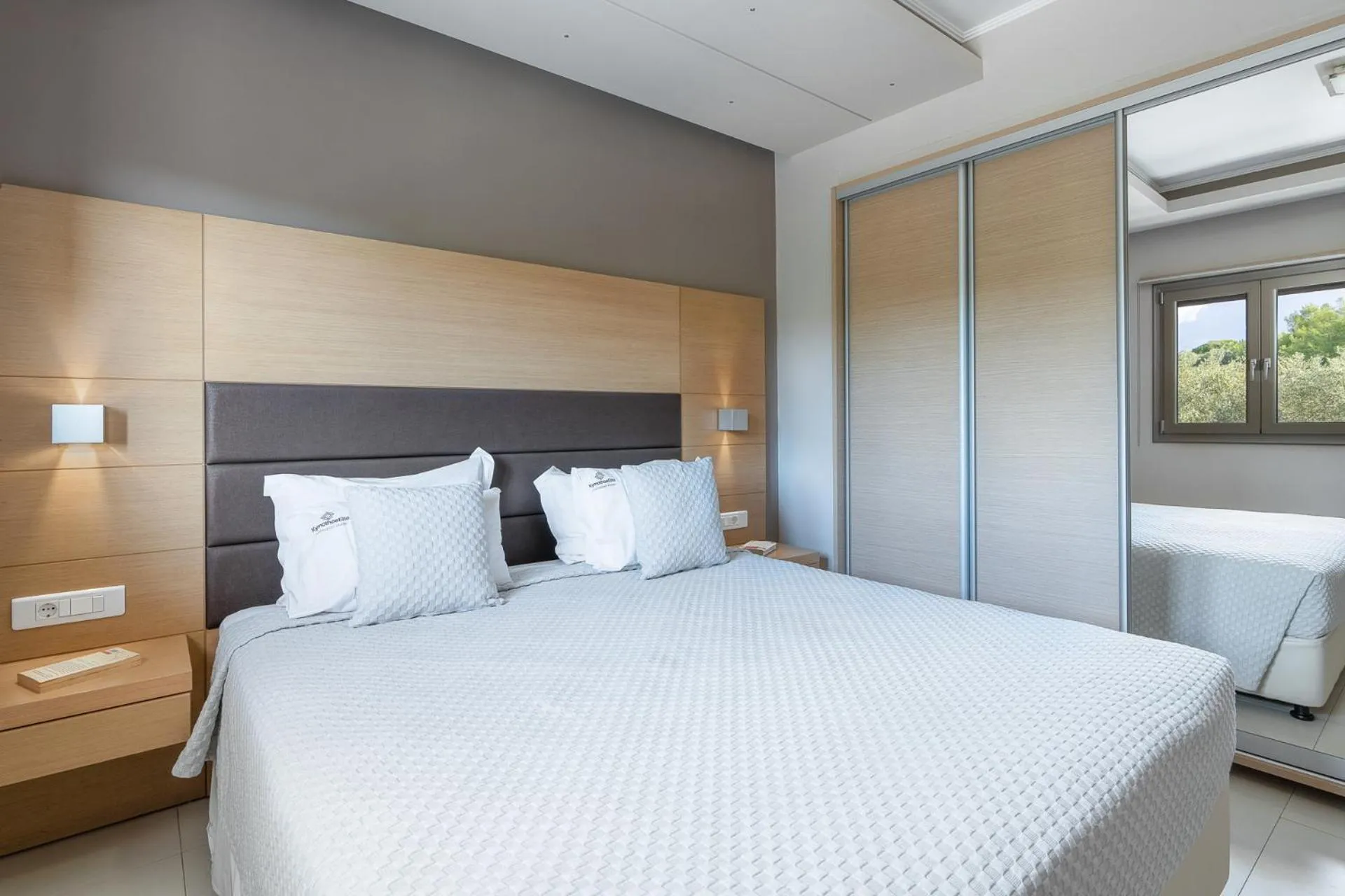 Bed in Kymothoe Elite Suites