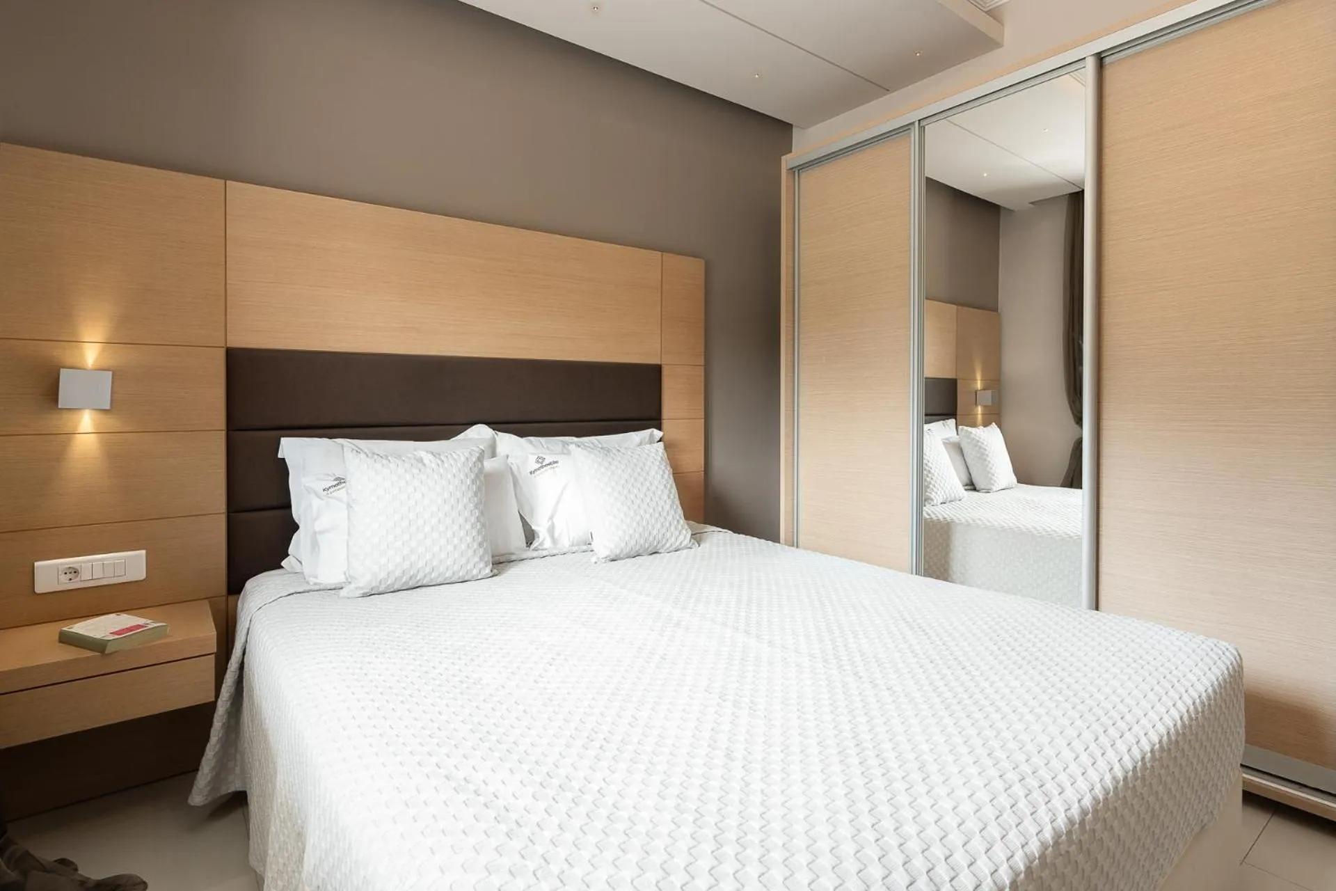 Bed in Kymothoe Elite Suites