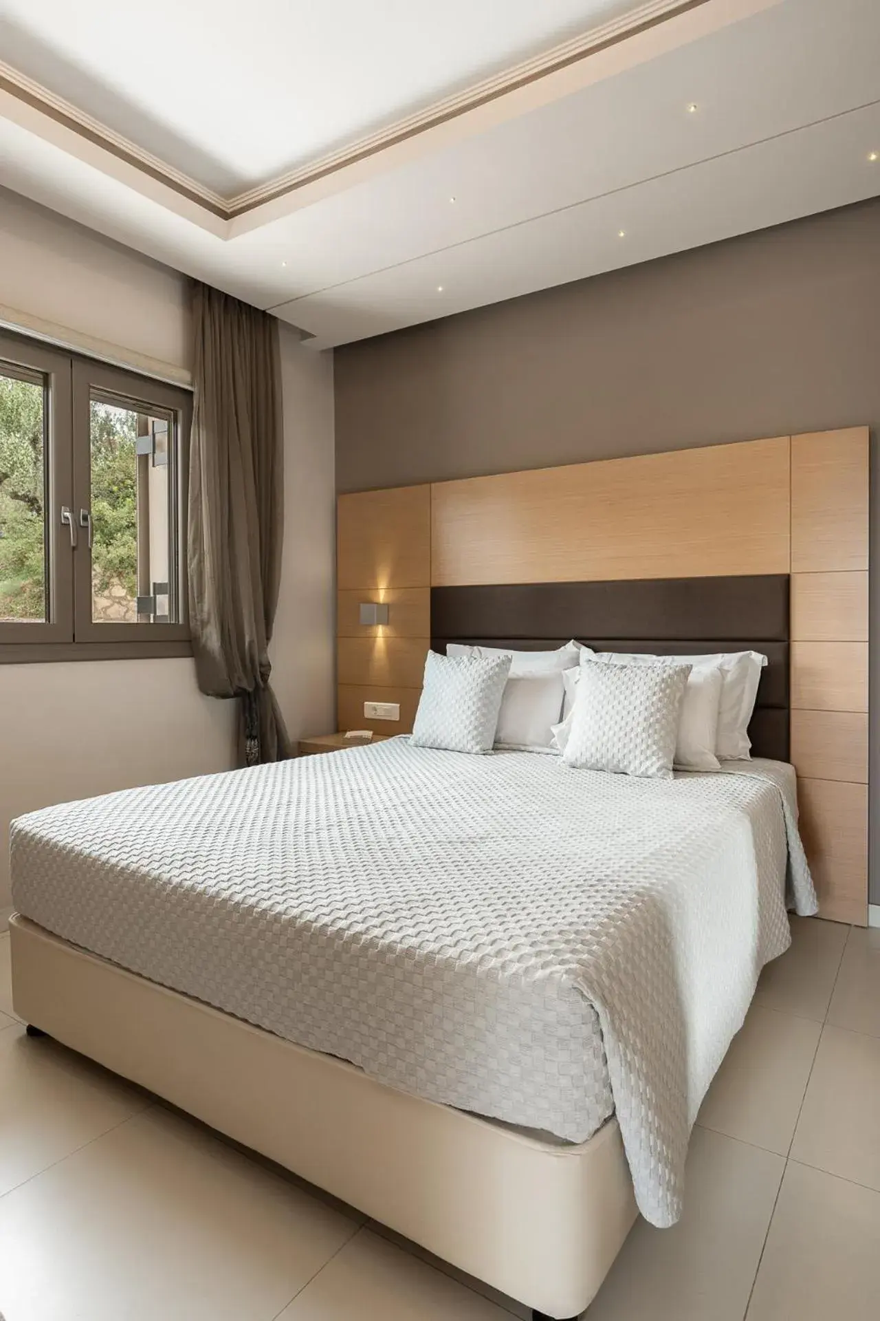 Bed in Kymothoe Elite Suites Bed in Kymothoe Elite Suites