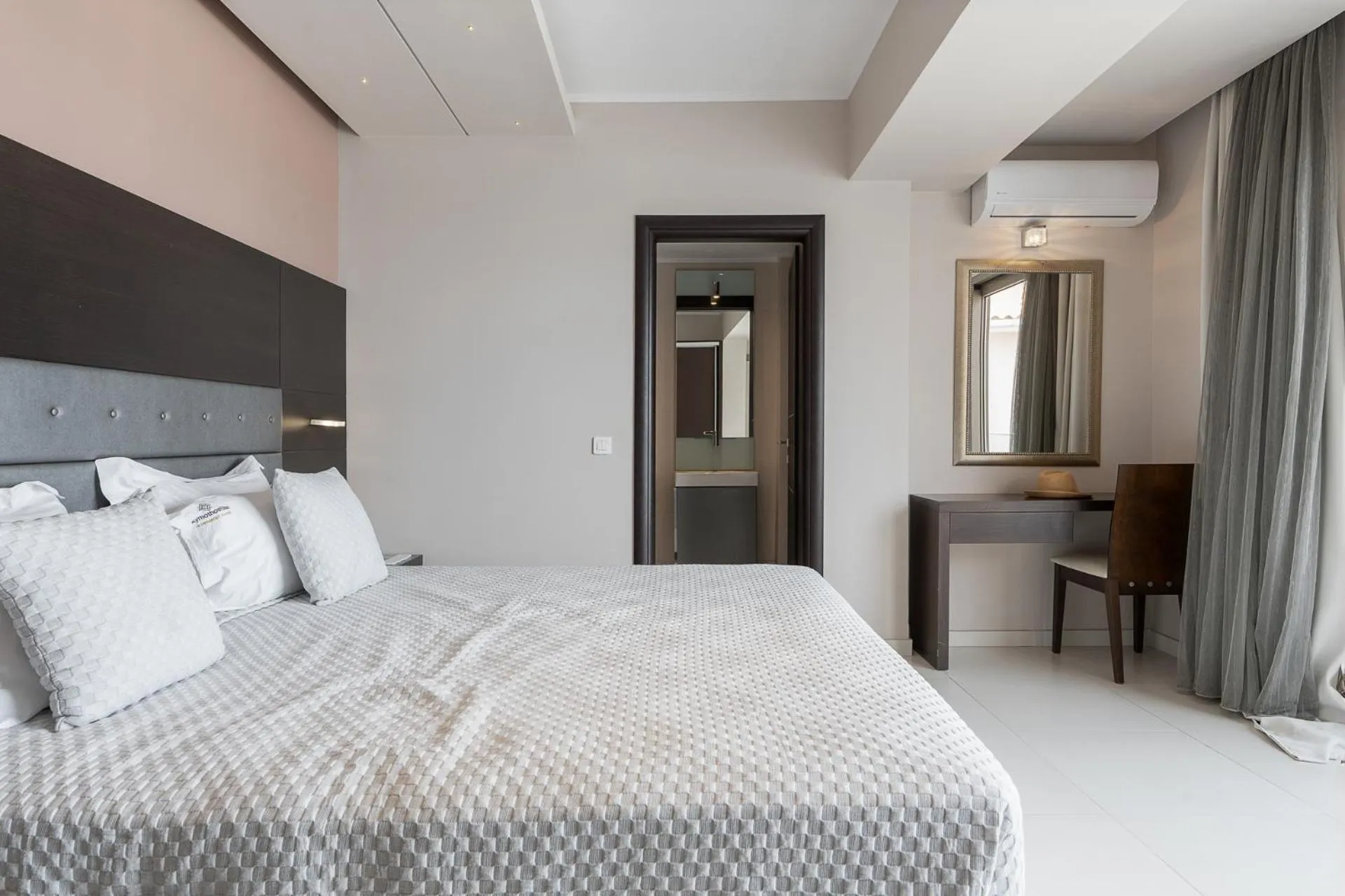 Bed in Kymothoe Elite Suites