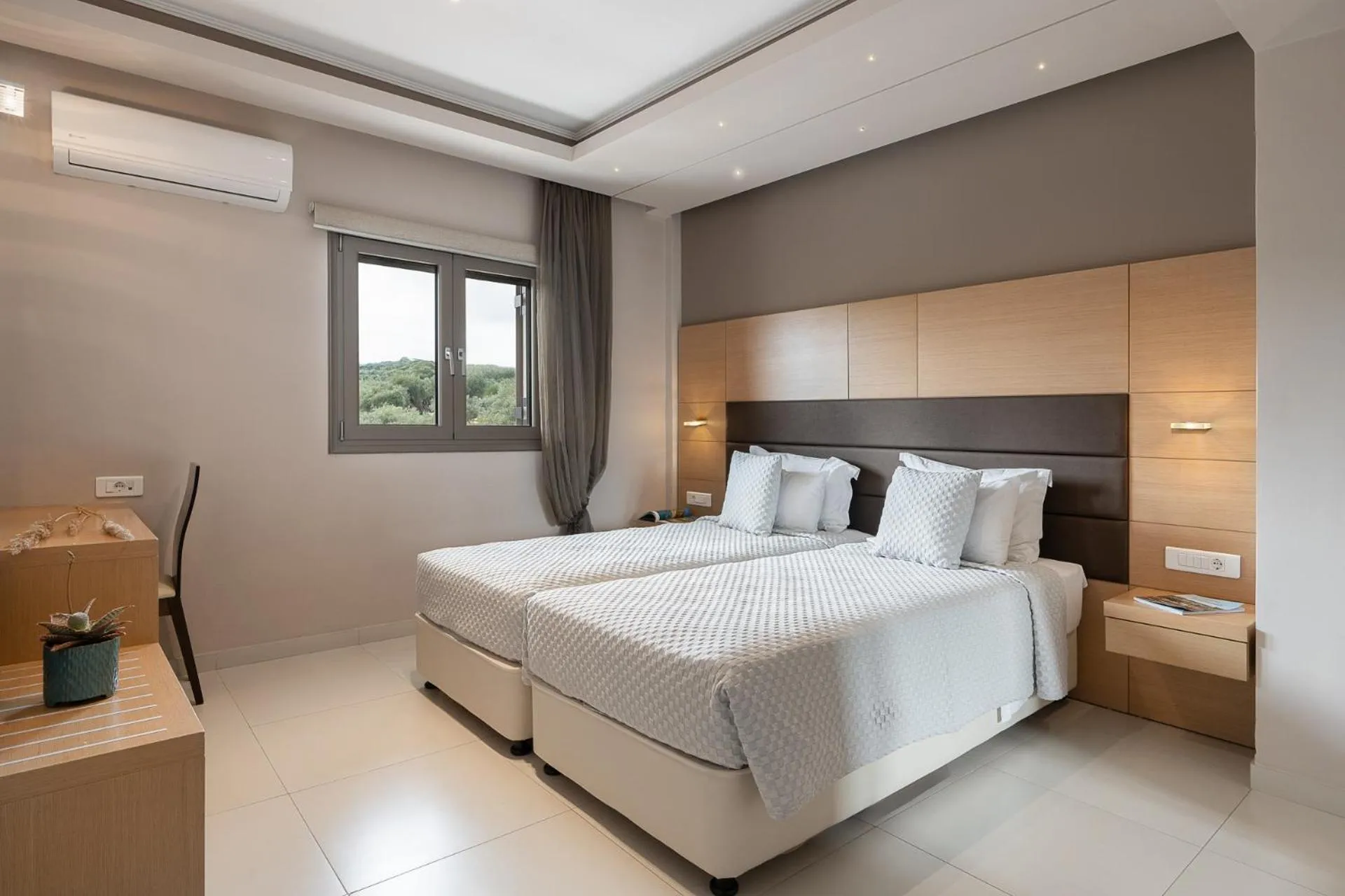 Bed in Kymothoe Elite Suites