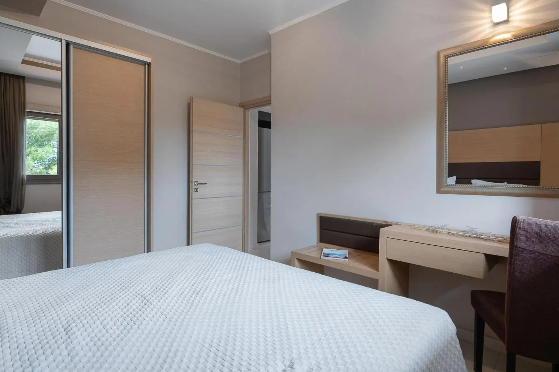 Bed in Kymothoe Elite Suites Bed in Kymothoe Elite Suites