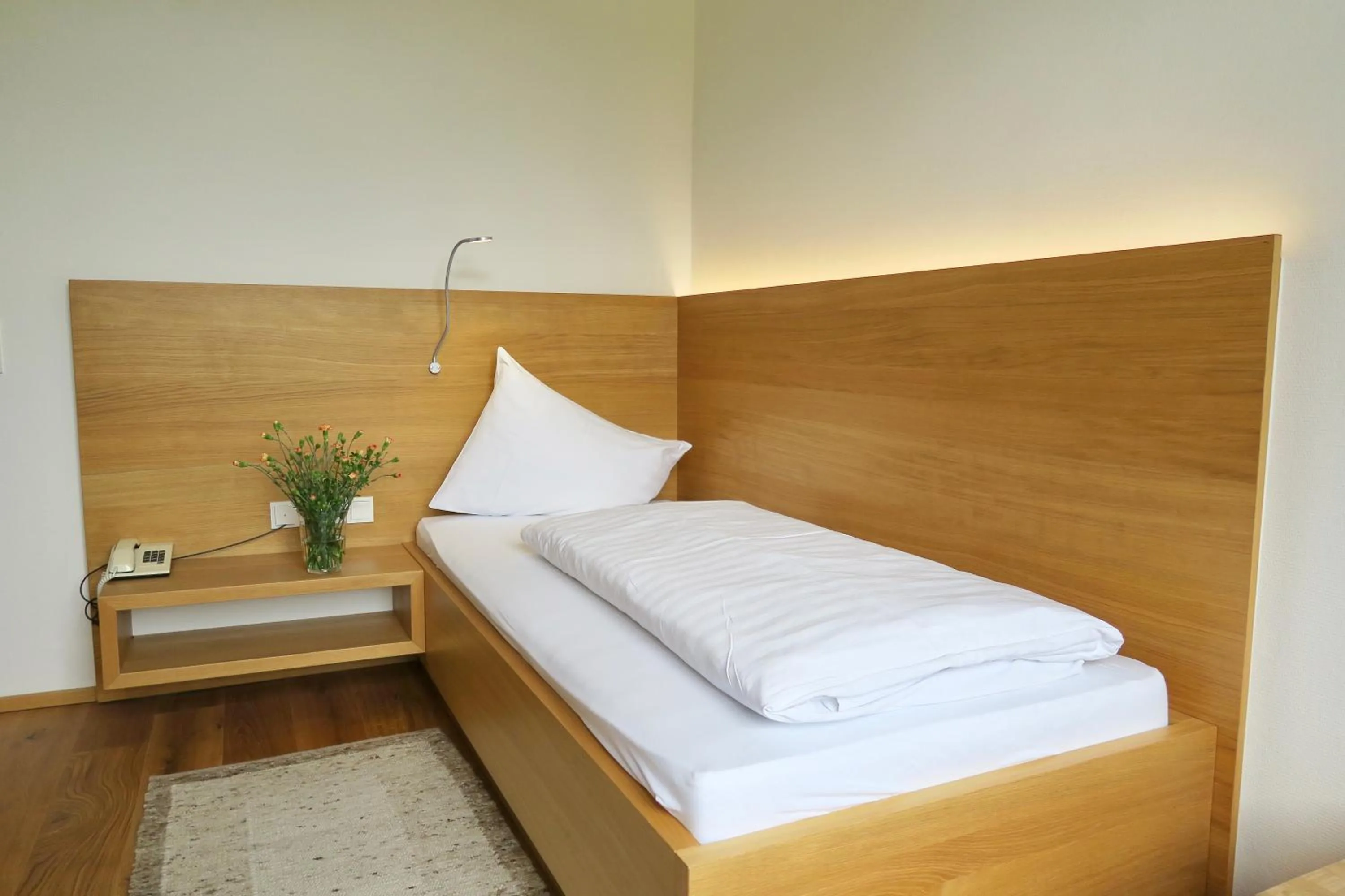 Bed in Hotel Vötterl