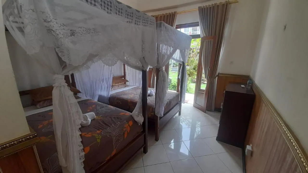 Bed in Aditya Homestay
