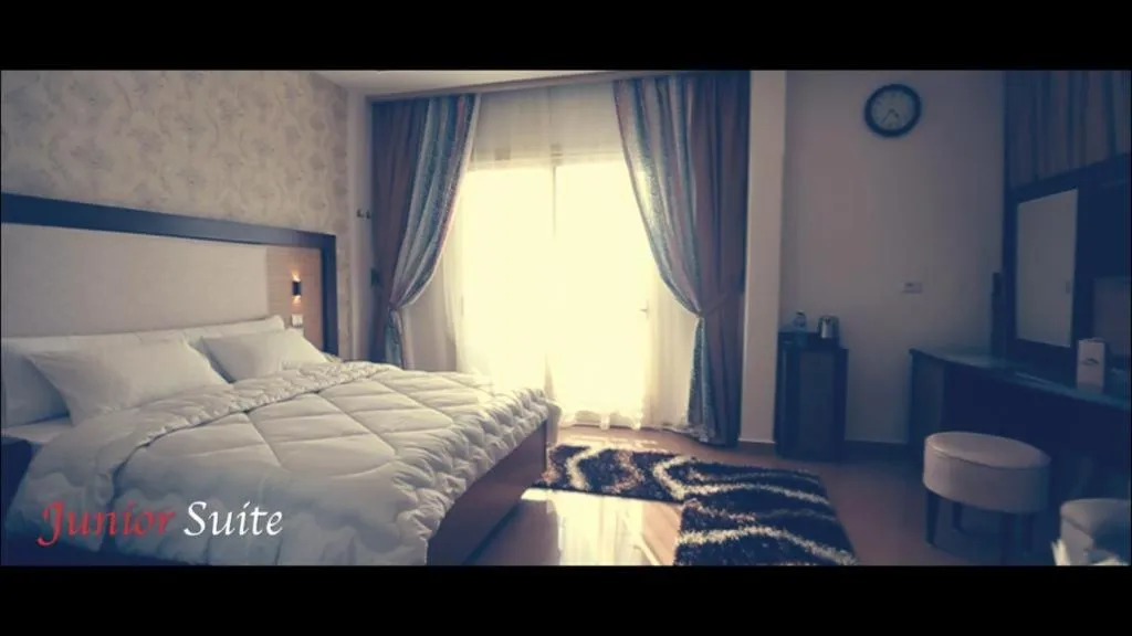 Bed in Dolphin Ras El-Bar Hotel