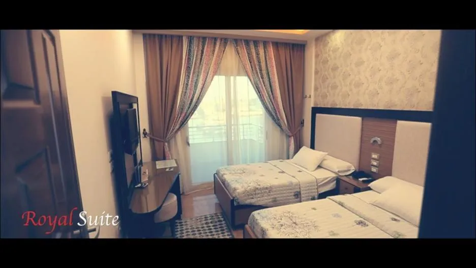 Bed in Dolphin Ras El-Bar Hotel