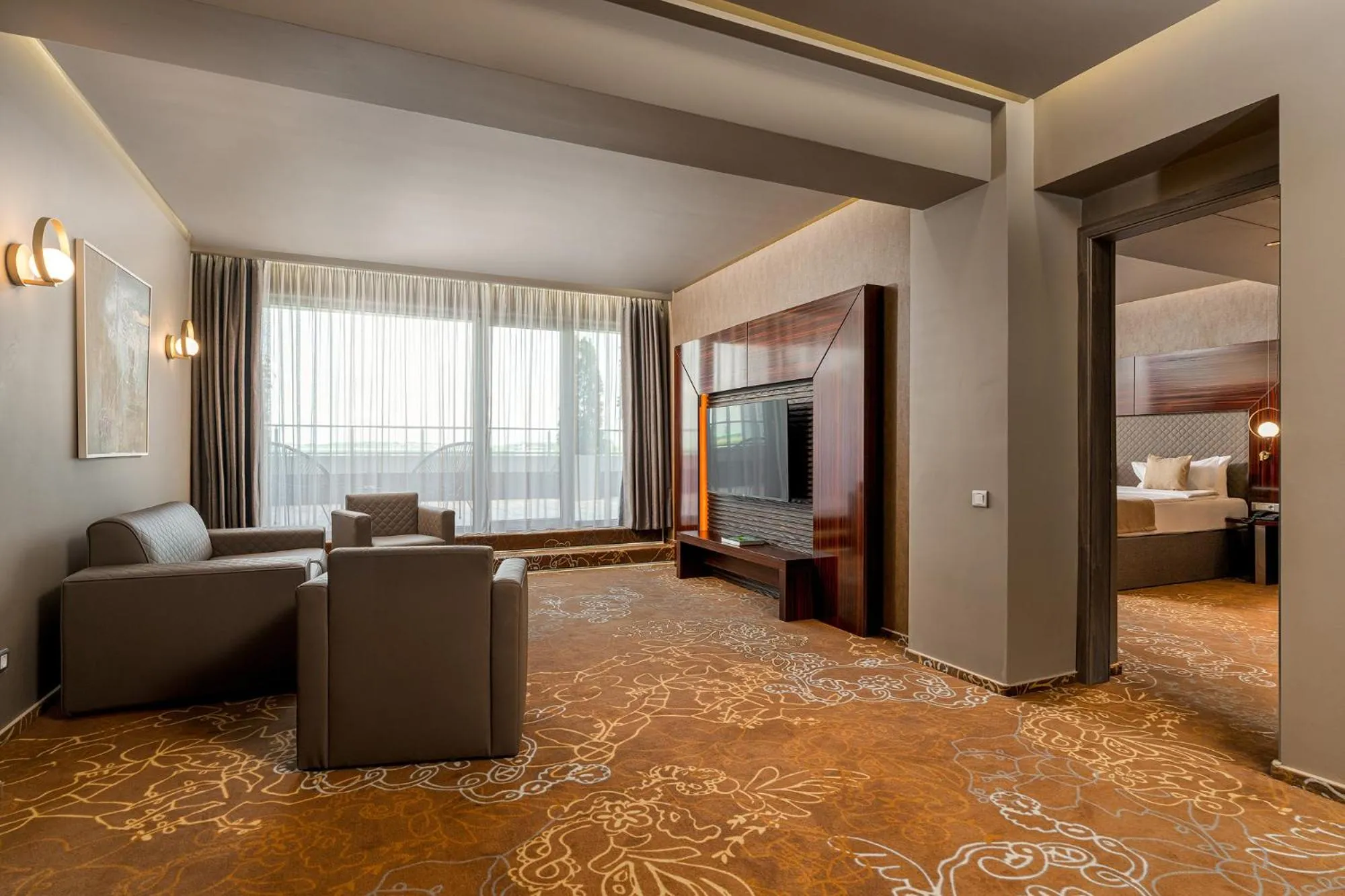 Living room, Bed in RIN Airport Hotel