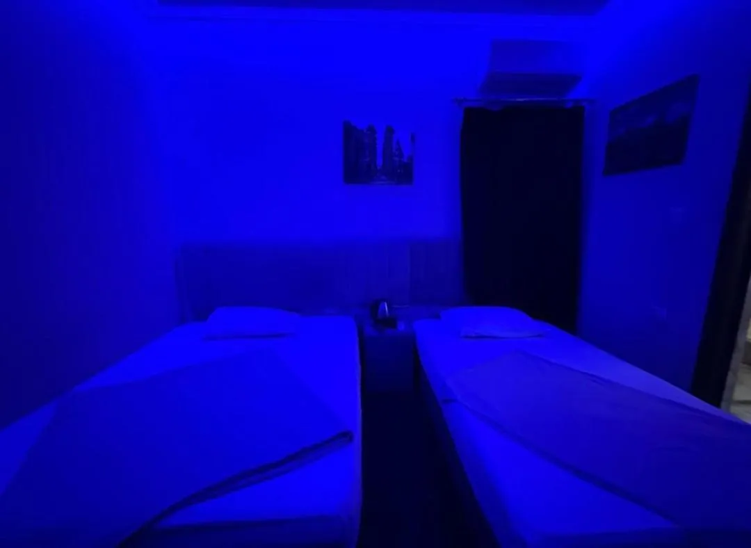 Bed in Pyramids Family Inn