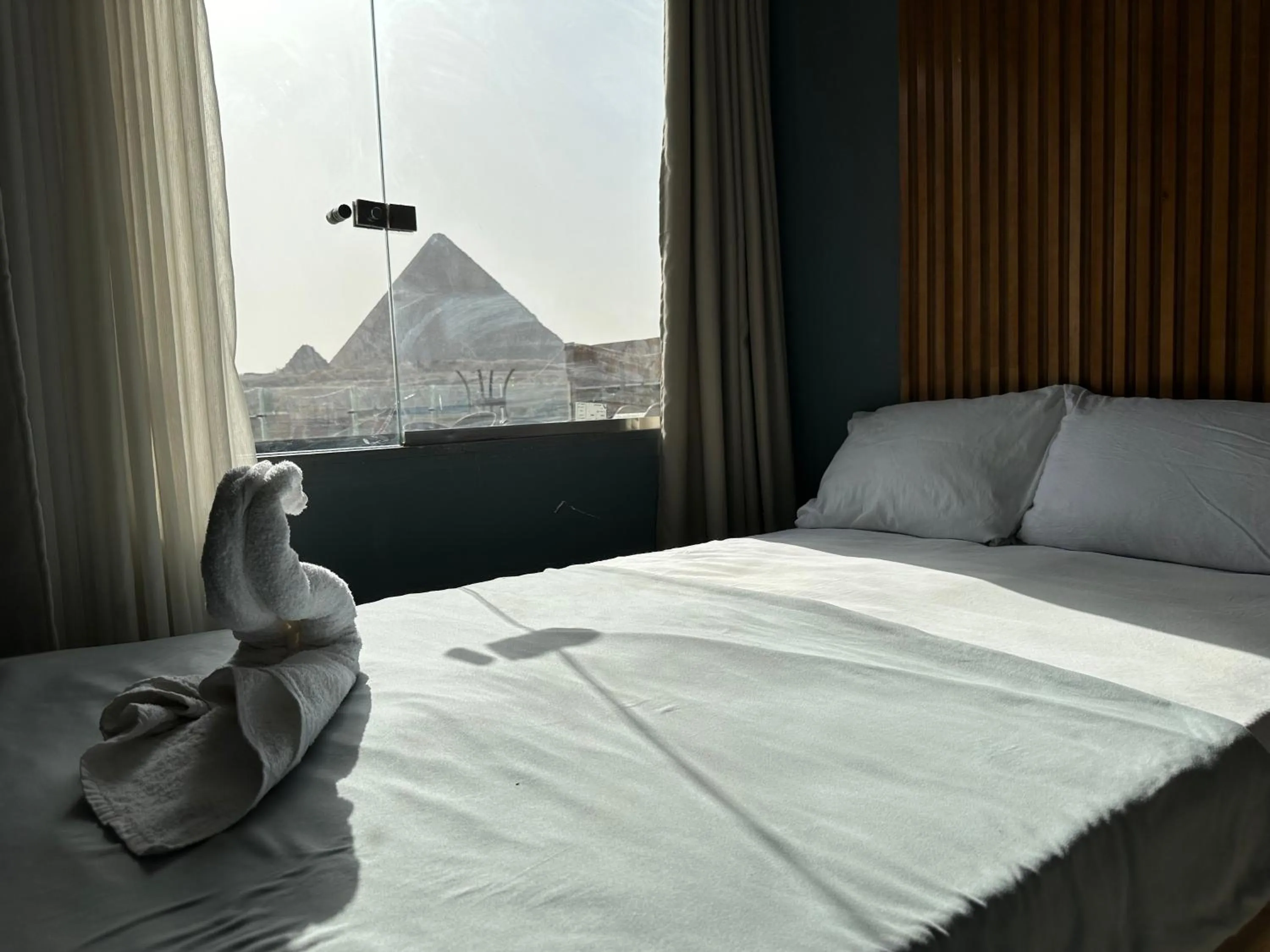 Bed in Pyramids Family Inn