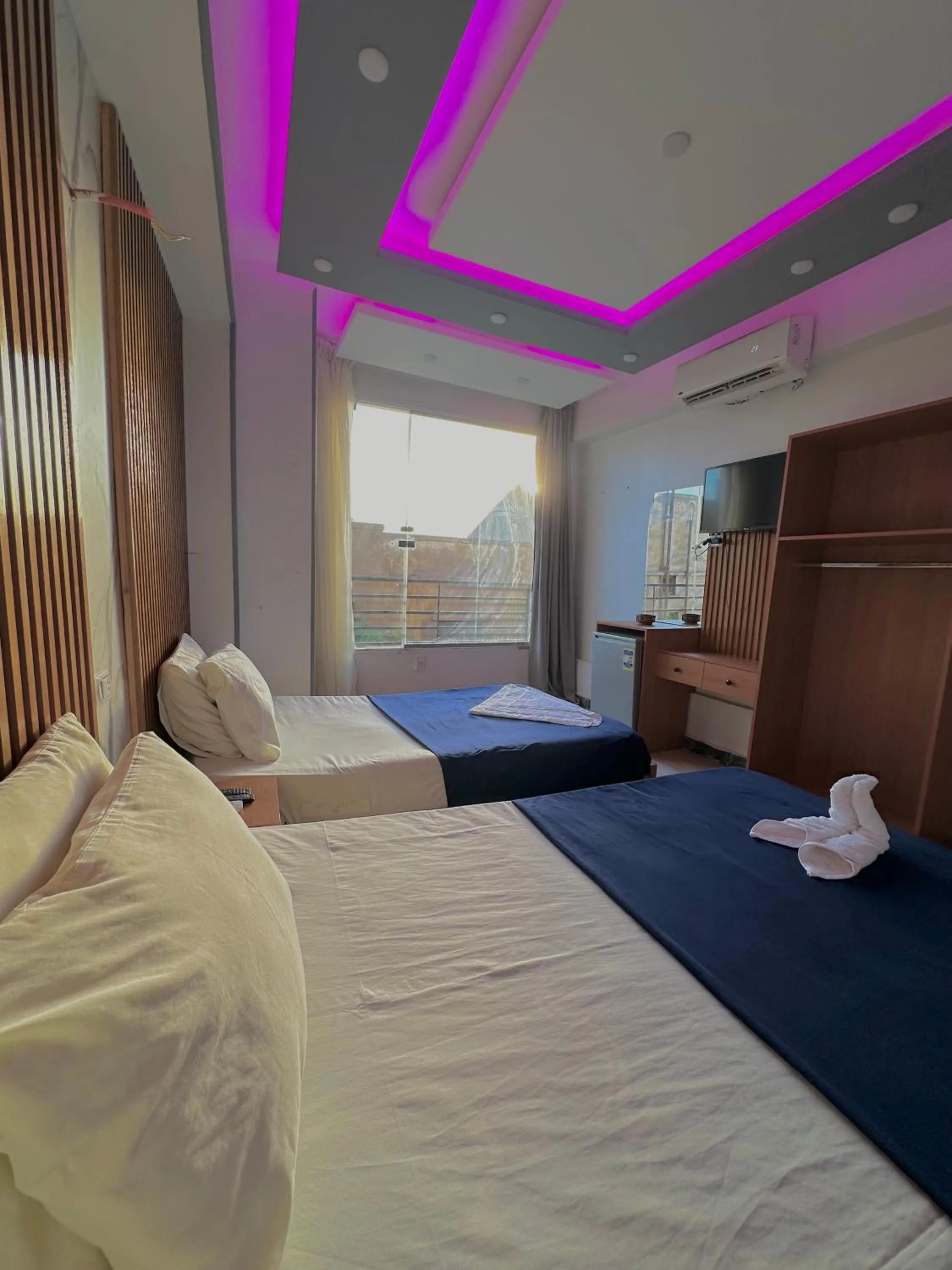 Bed in Pyramids Family Inn