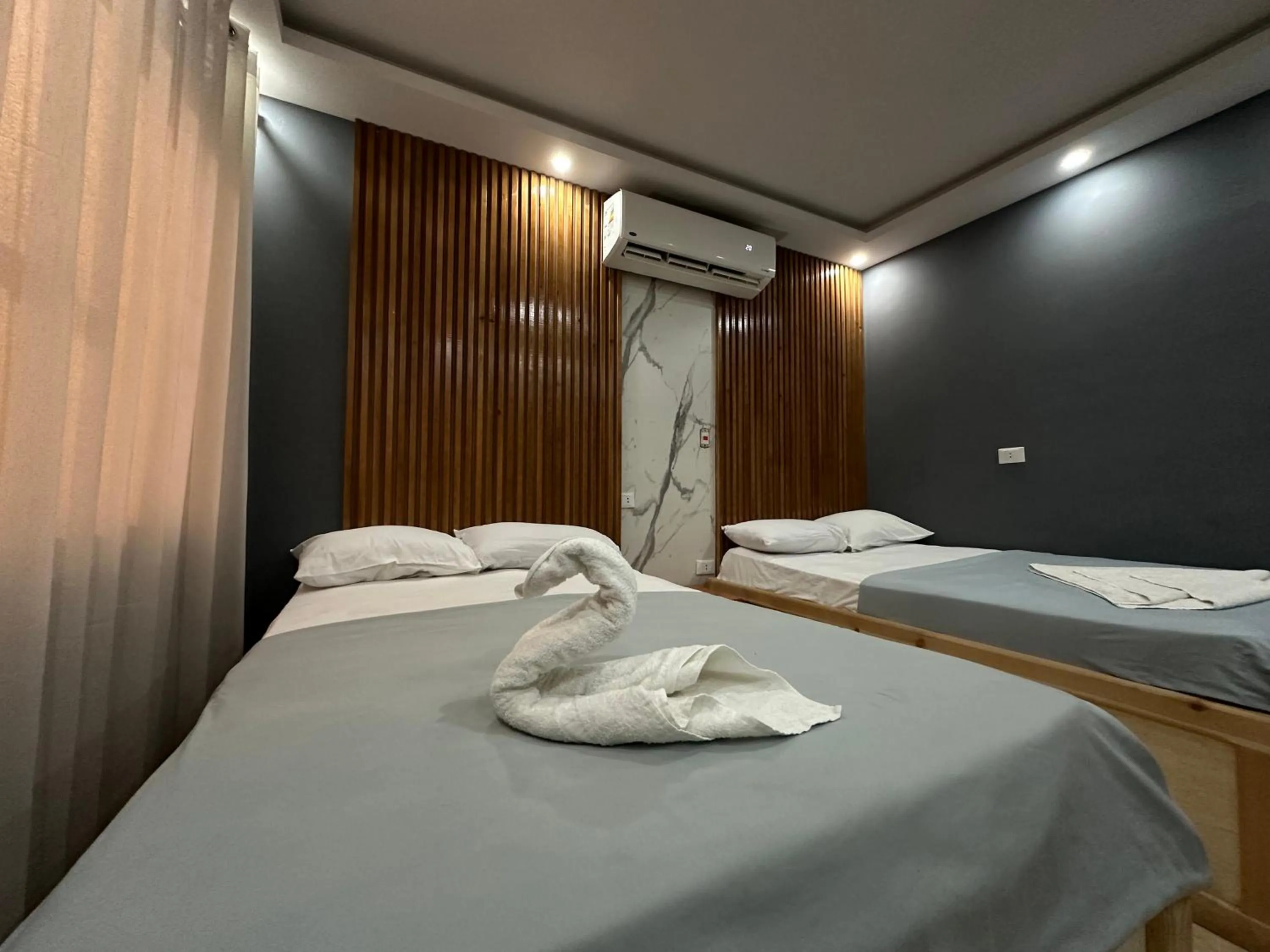 Bed in Pyramids Family Inn