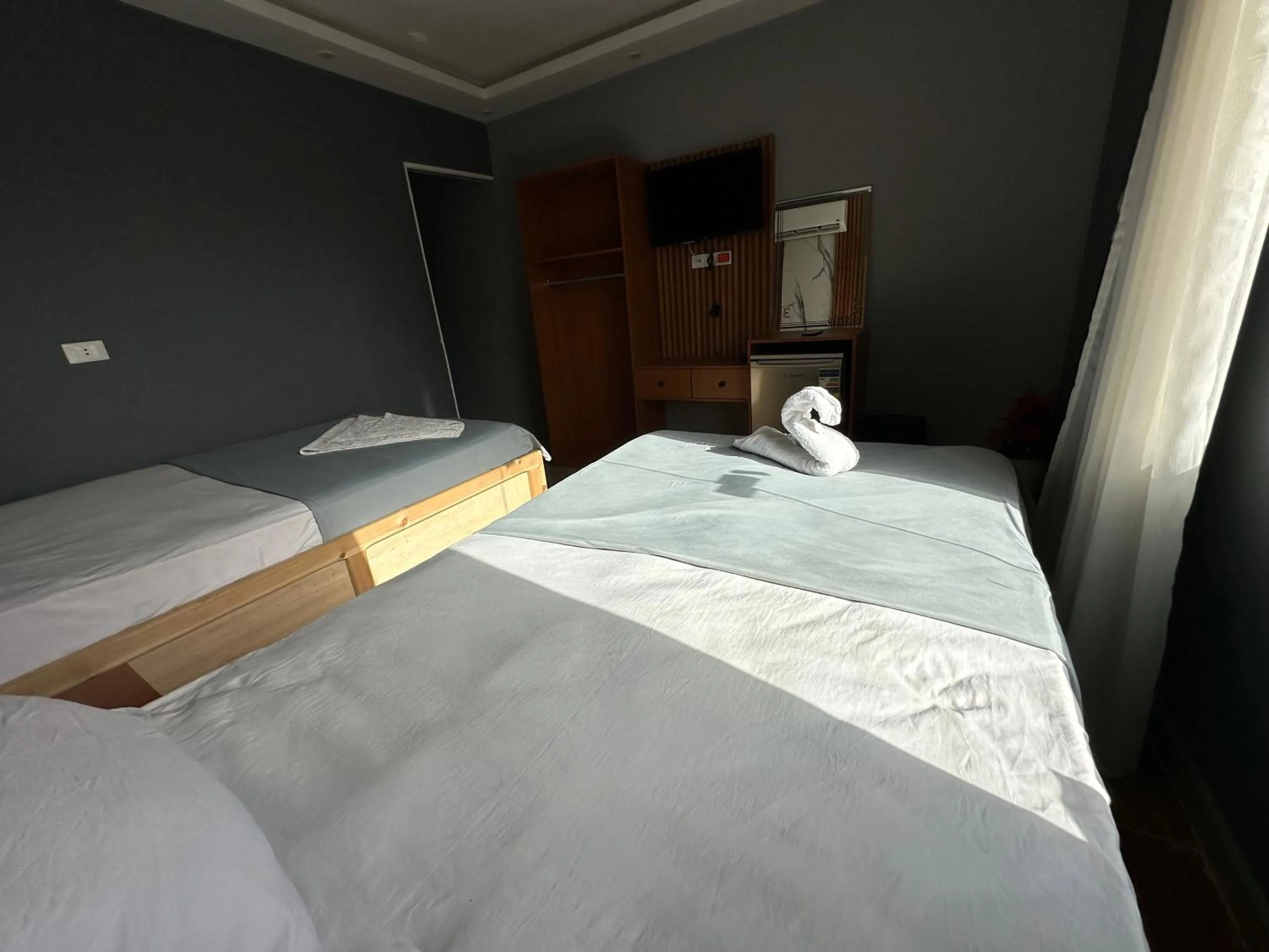 Bed in Pyramids Family Inn