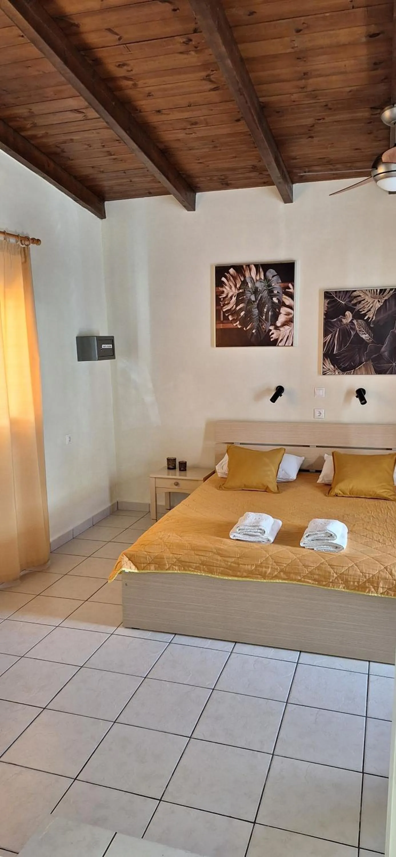 Bed in Nicolas Studios & Apartments