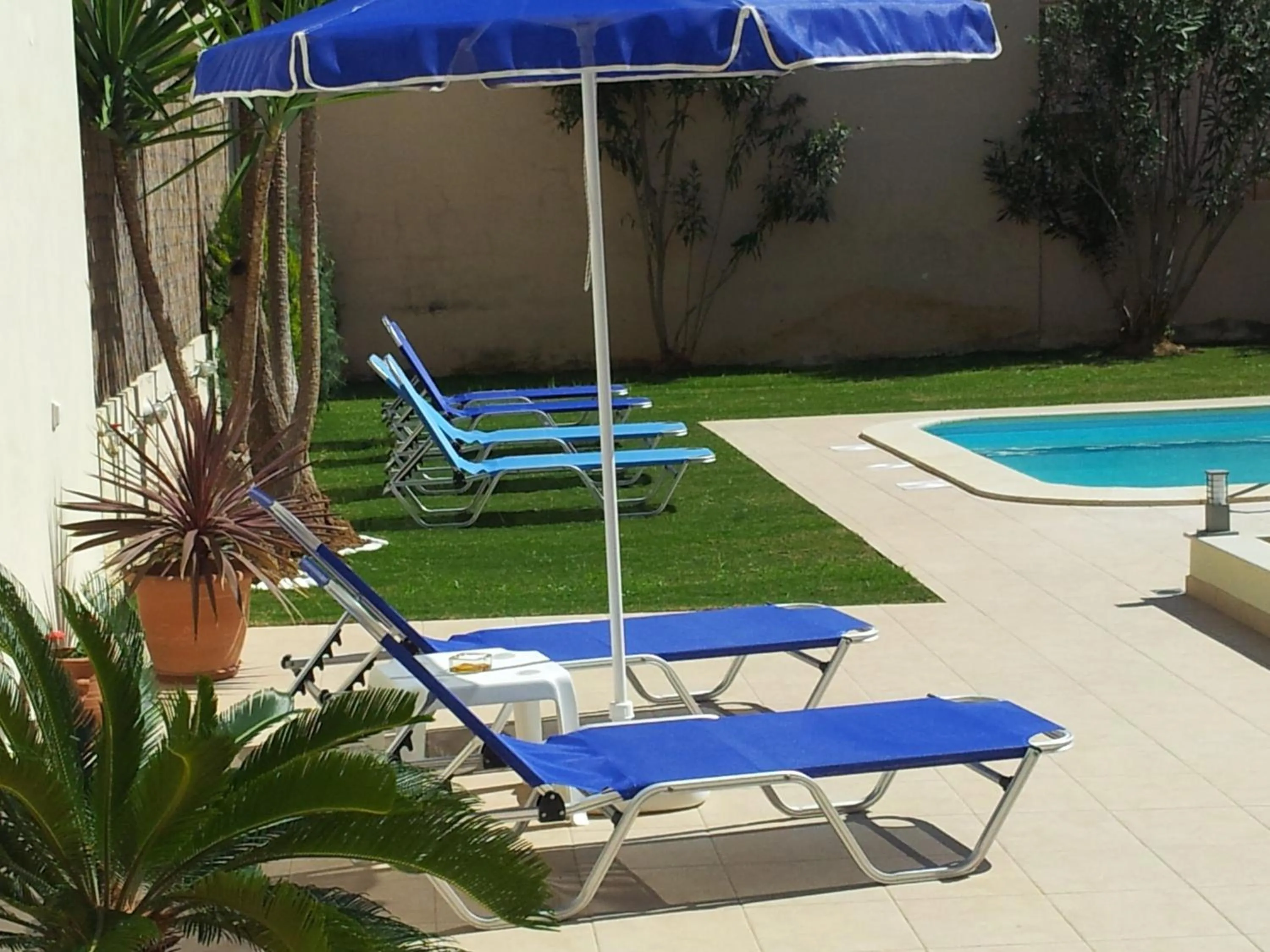 Swimming pool in Nicolas Studios & Apartments