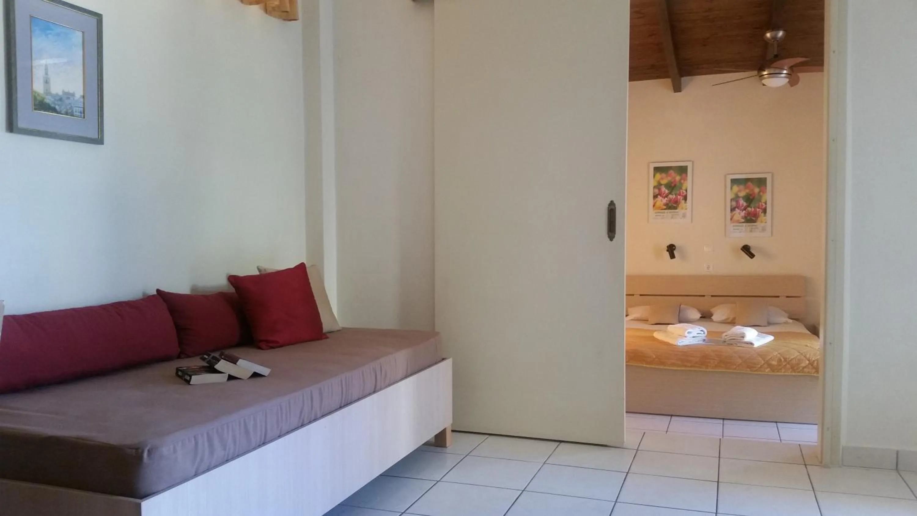 Living room, Bed in Nicolas Studios & Apartments