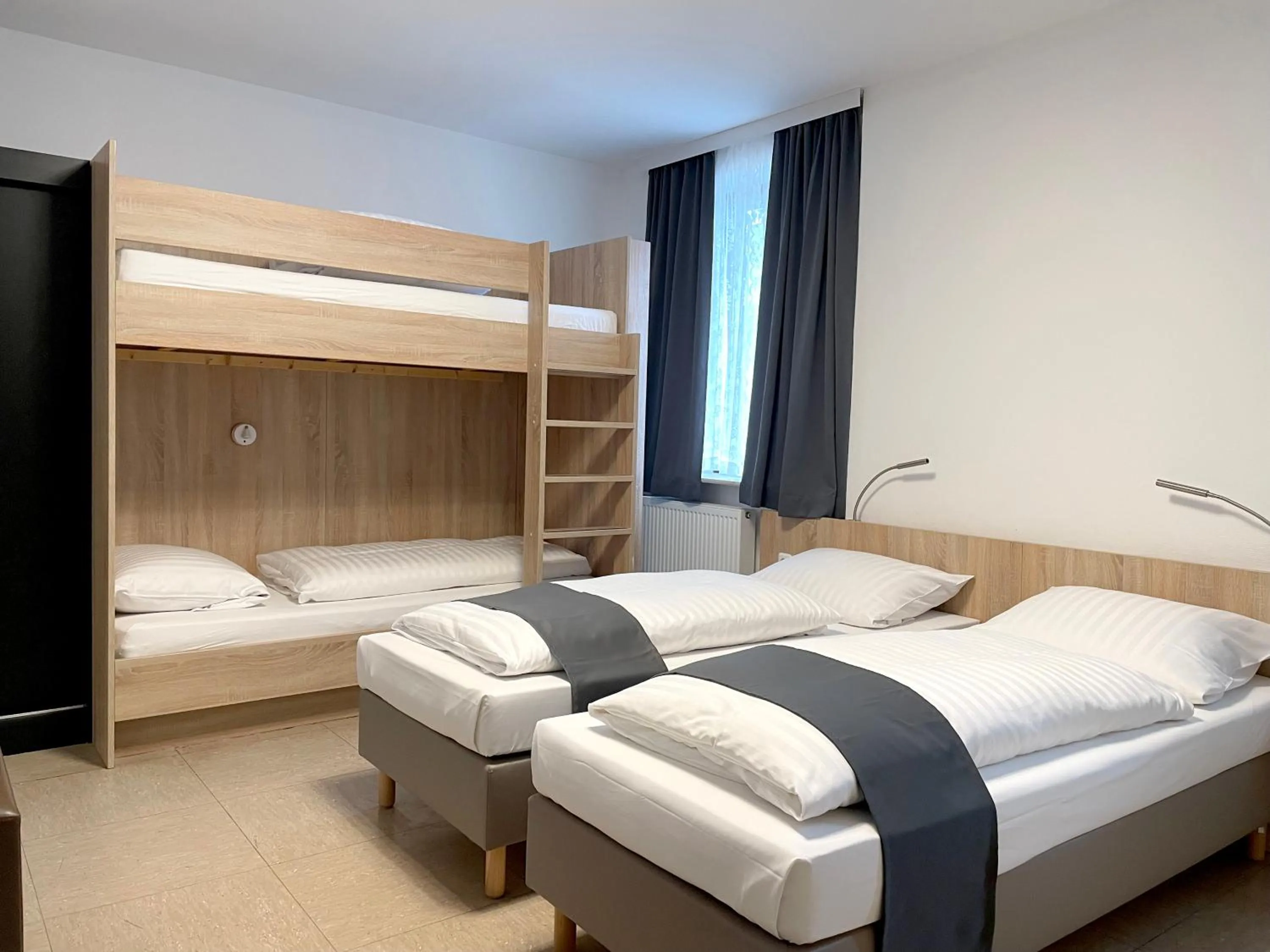 Bed in Hana Aparthotel