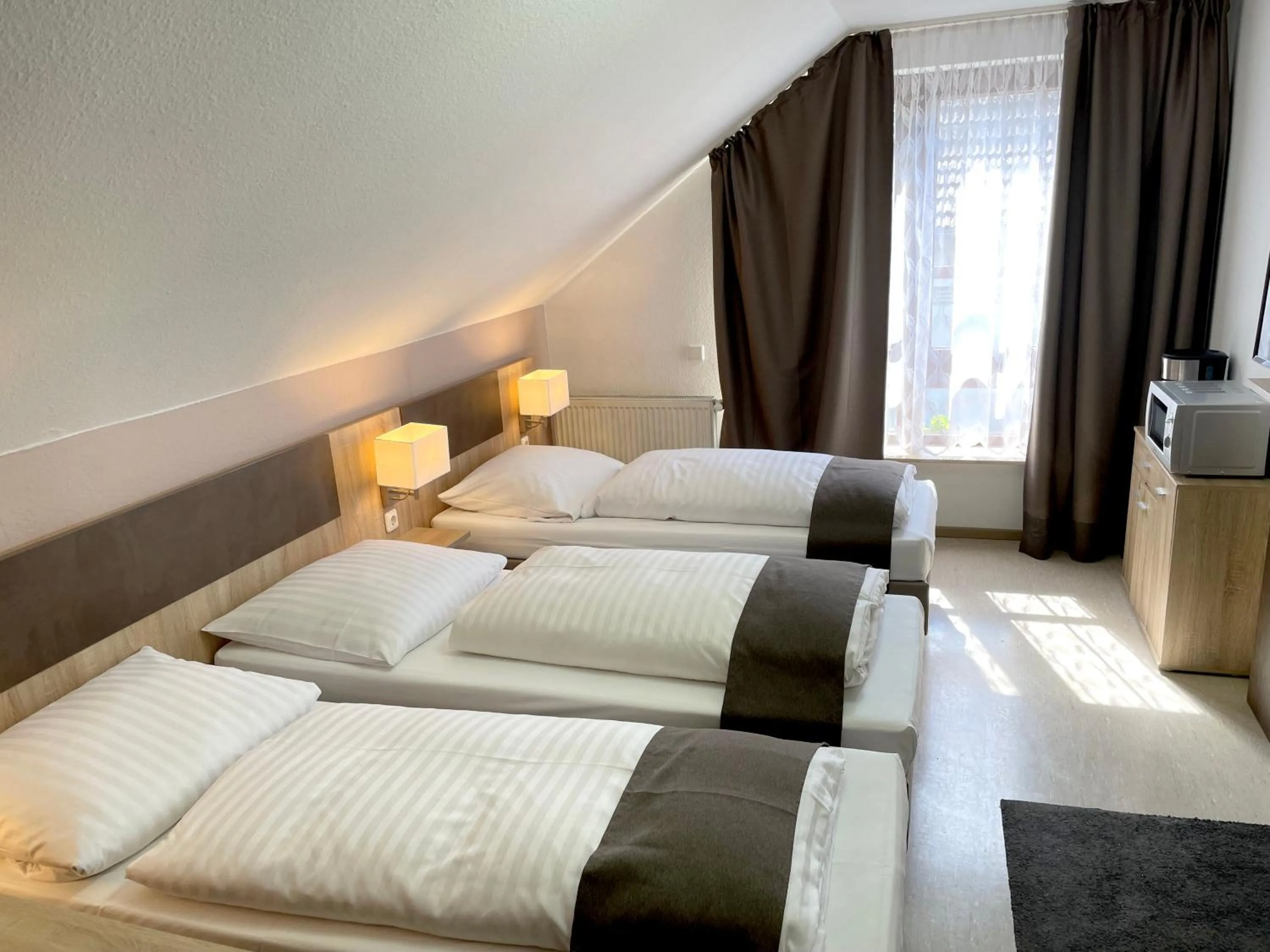 Bed in Hana Aparthotel