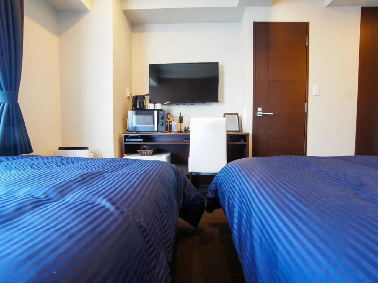 Bed in HOTEL LiVEMAX Yokohama Motomachi Ekimae