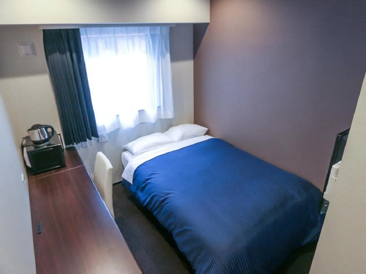 Bed in HOTEL LiVEMAX Yokohama Kannai Ekimae