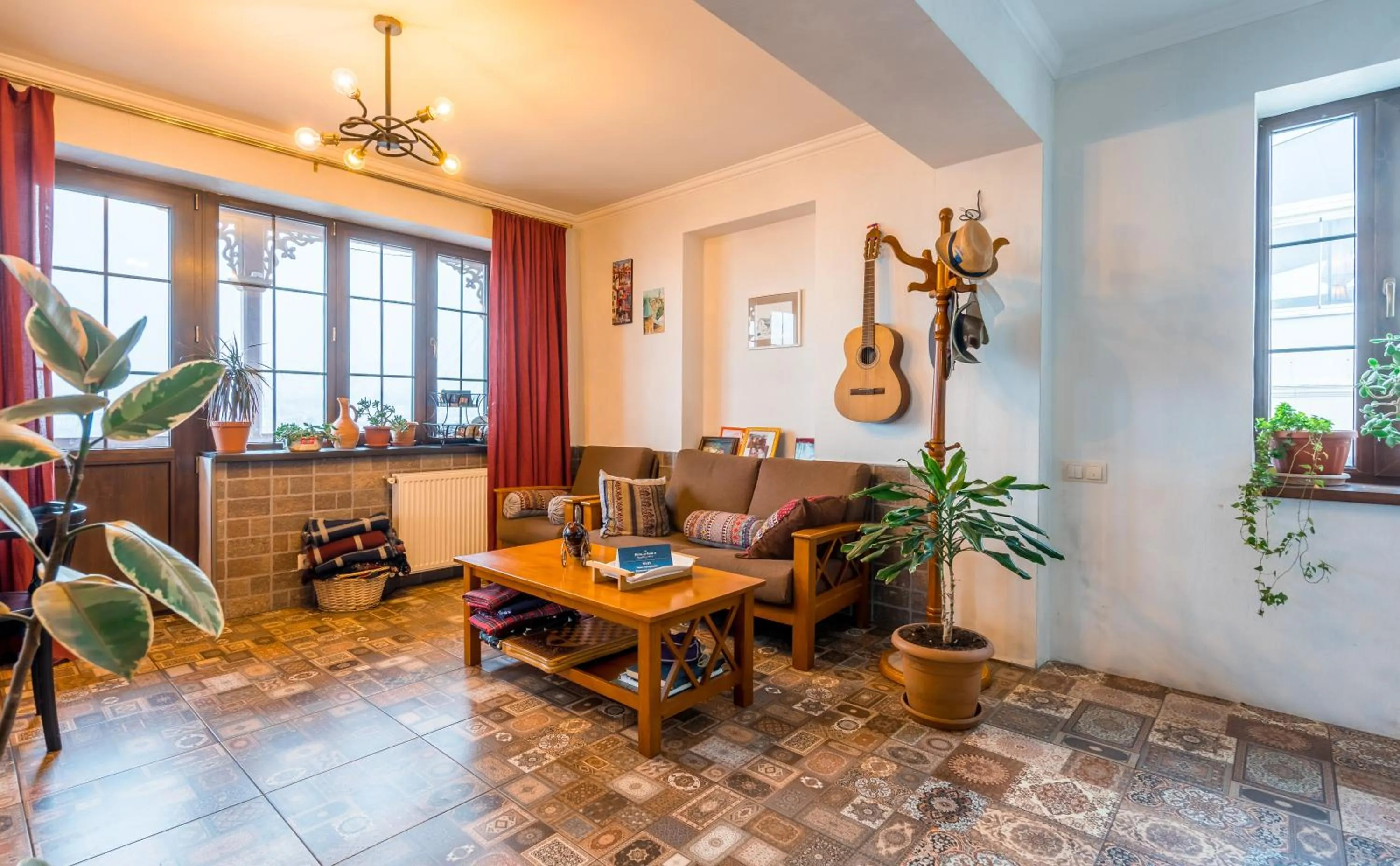 Communal lounge/ TV room in Hotel at Gomi 19