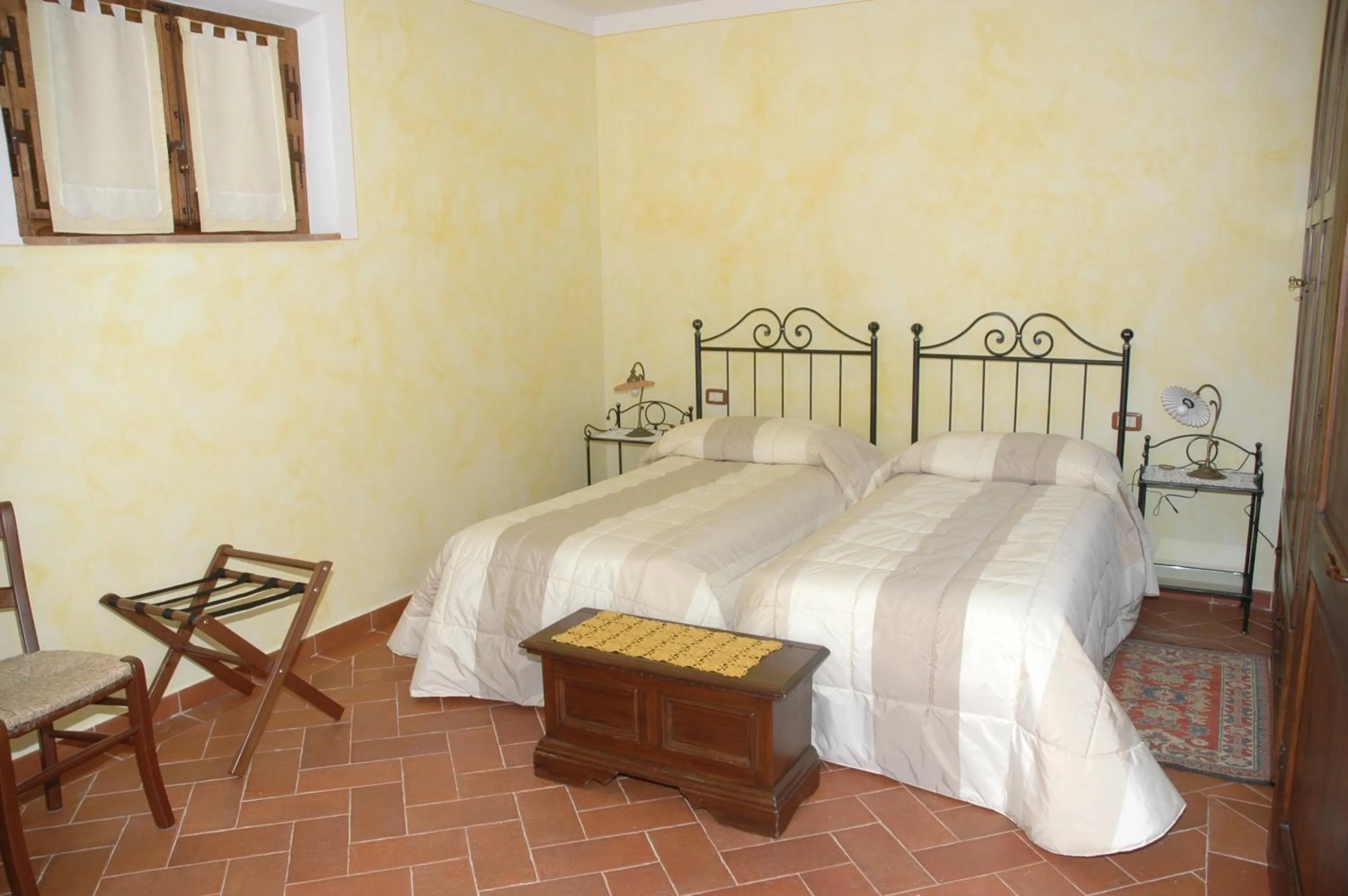 Bed in Piccolo Hotel San Valentino