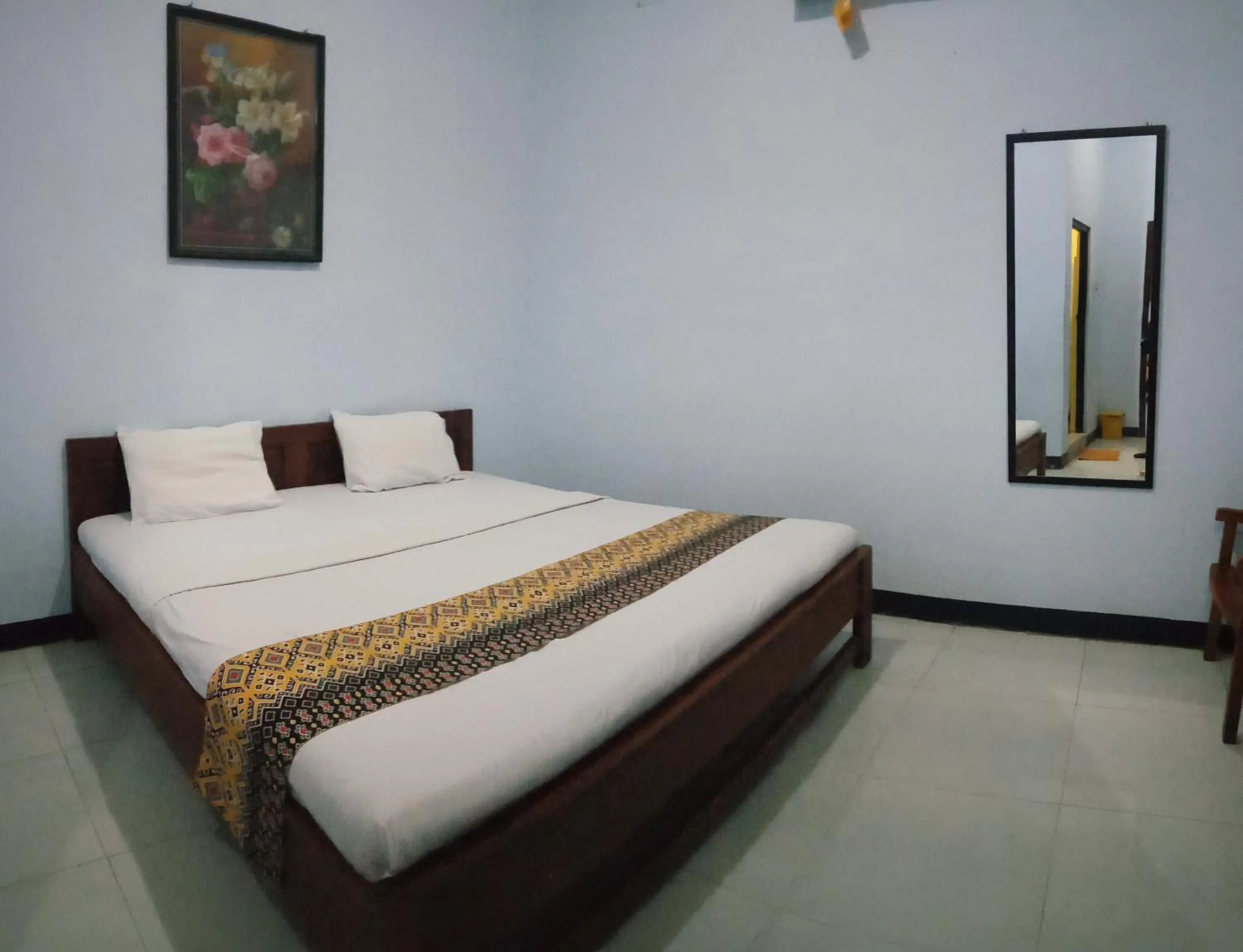 Bed in Hotel Ilhami Blitar