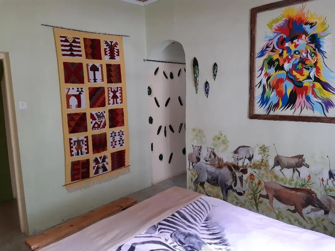 Bed in Aloepark Art Hotel